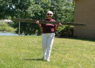 75510_mom_carries_2x4.jpg