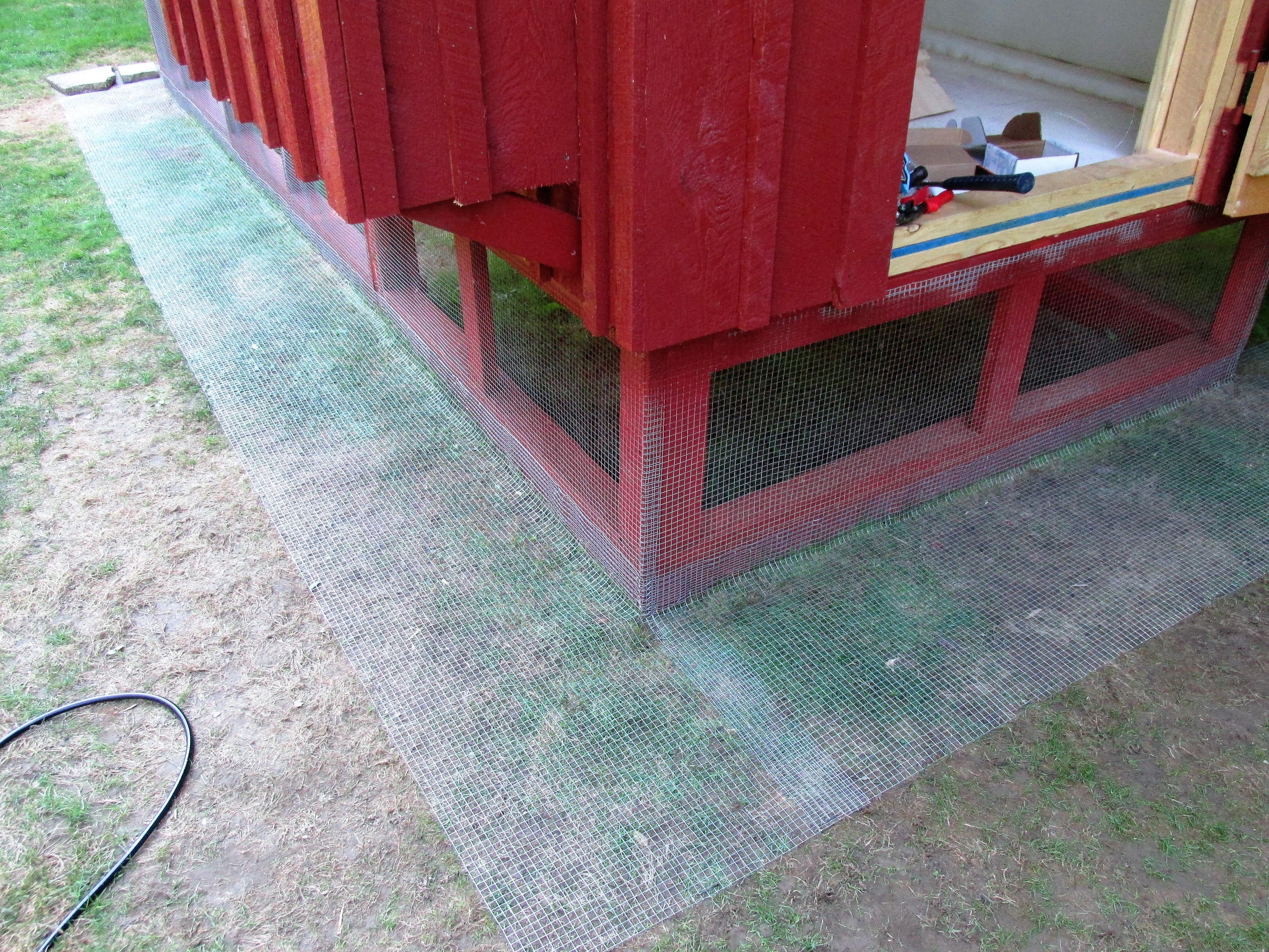 1/2" hardware cloth, 2 ft. apron around coop and run