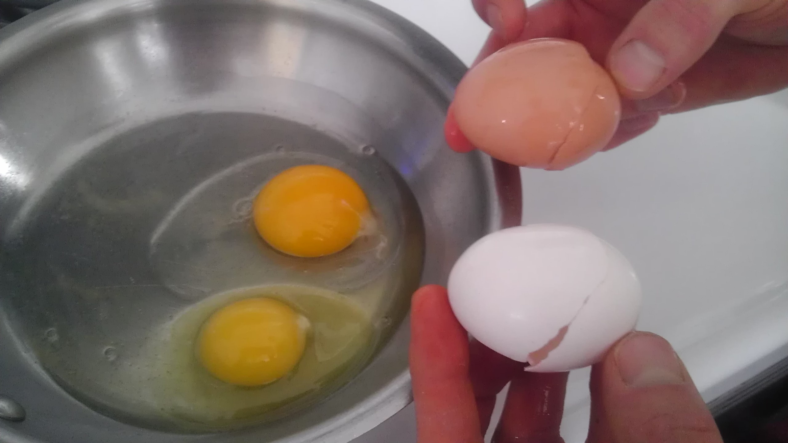 1 is store bought; the other's from our hens.  You decide.
