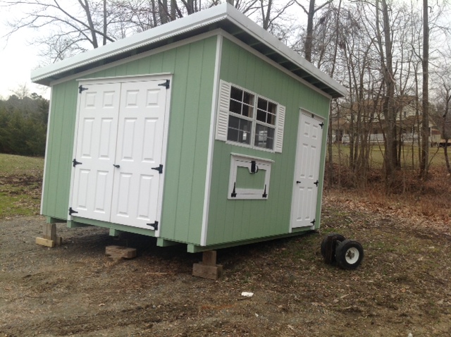 10 x 12 shed roof, coop divided down the middle with storage.
18 inch overhang, metal roof.
Nest Door access 36 long 18 inches high.
double doors on coop side for easy cleaning.
Will put coop doors and both sides of double doors.
Can divide the coop and run in half later, if need be.
Doors are fiberglass.