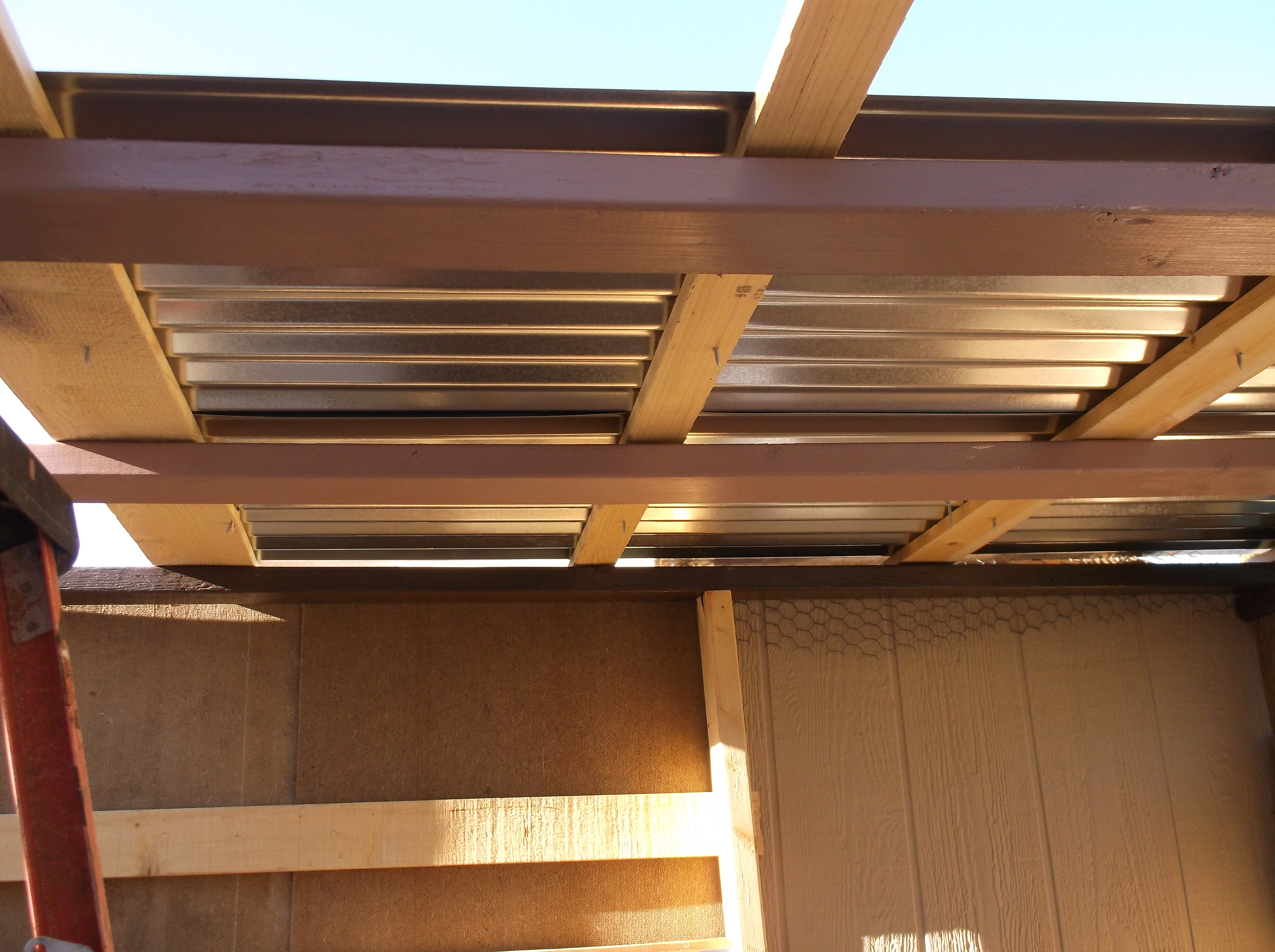 2 sheets of roofing installed.