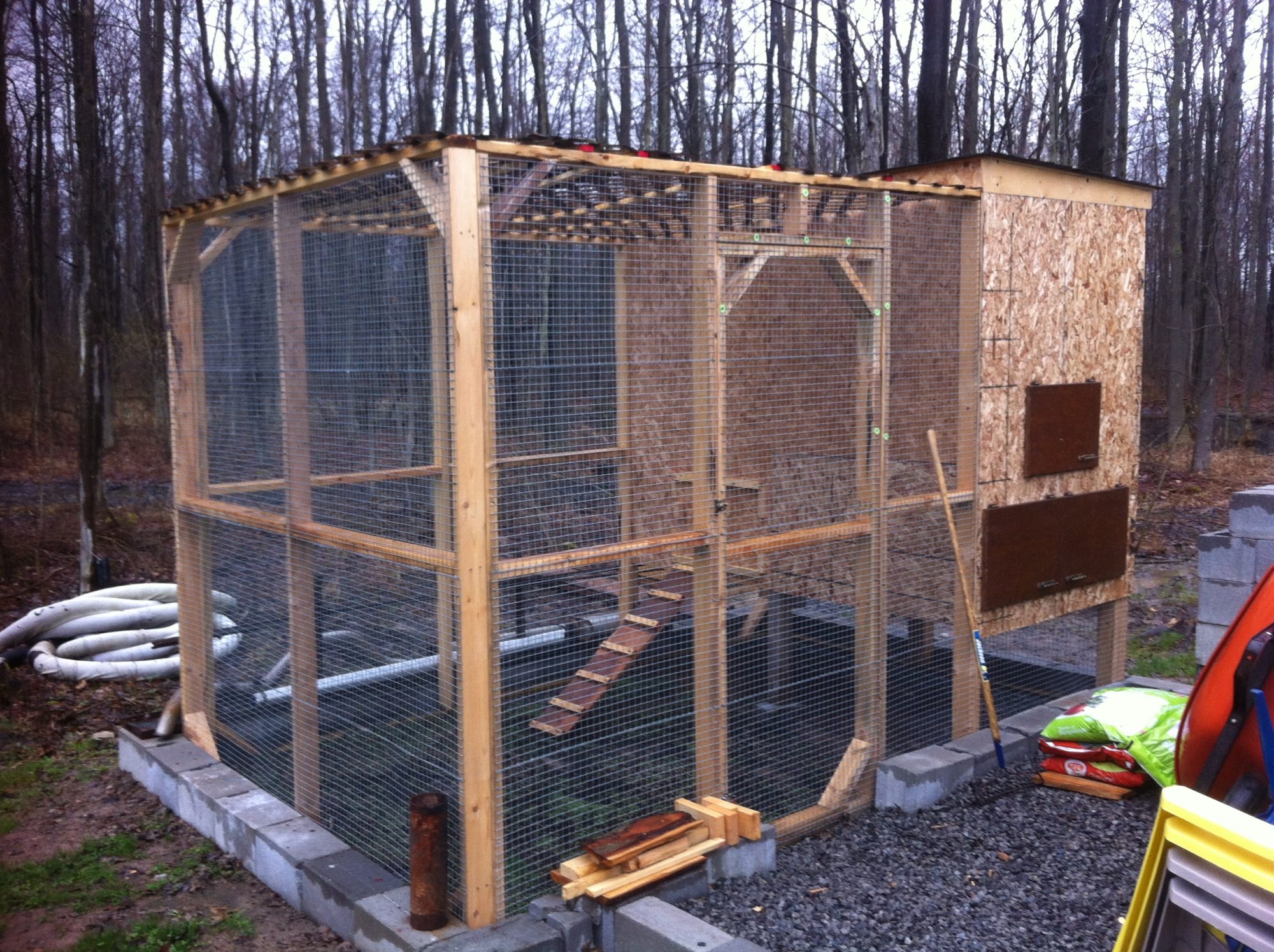 8x12 coop , have added a windows and a new more secure roof