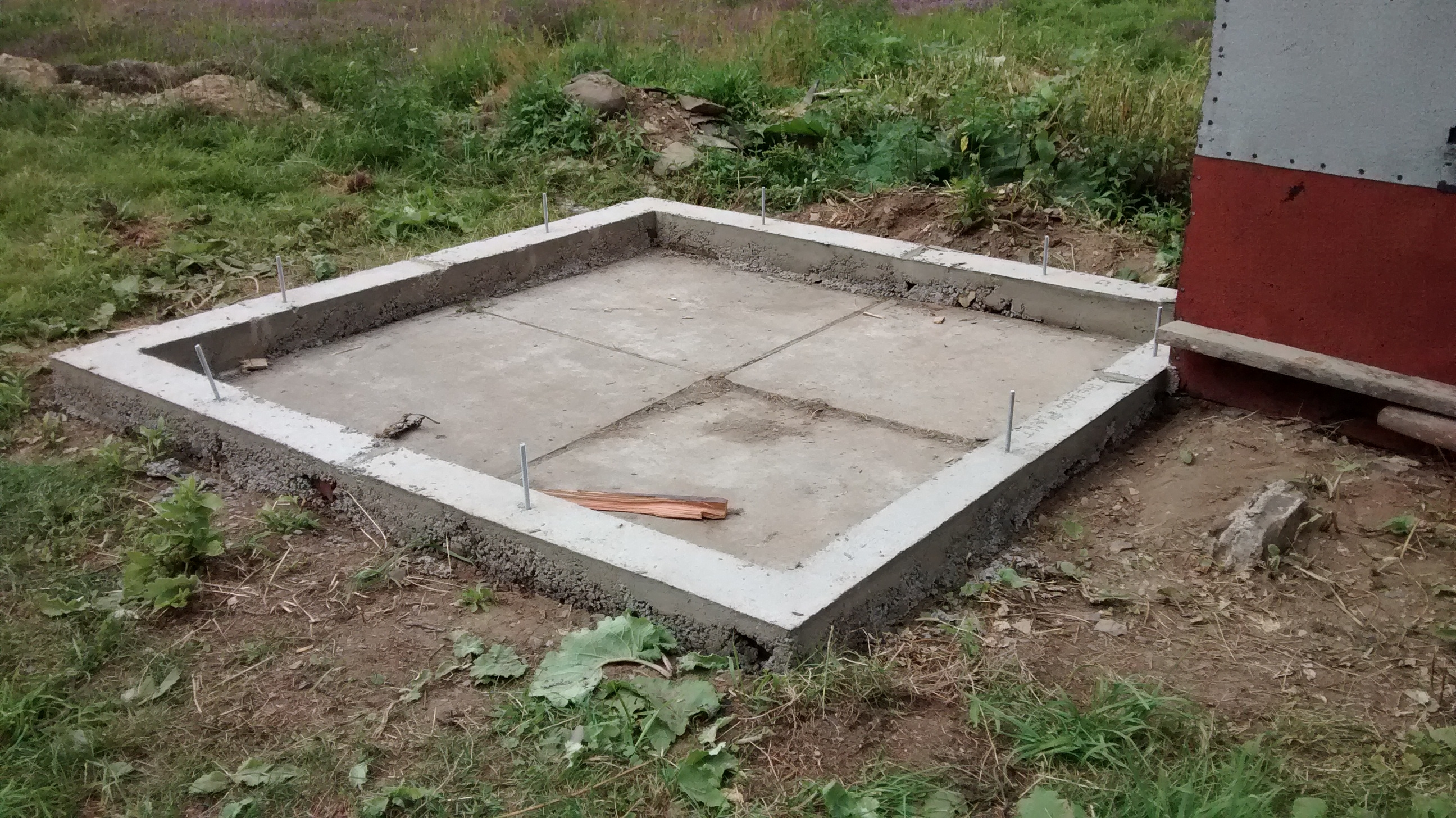 8x8 small chicken coop footing is in. Needs more fill and patching. Small door will be placed in the in the lower right side corner. 7/25/2015