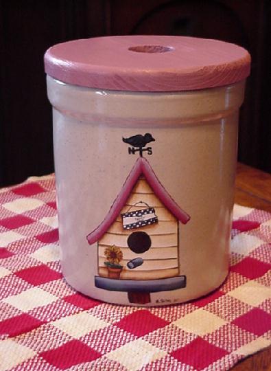 A 2qt crock I painted to hide a toilet brush. This was actually sold in Country Sampler Magazine.