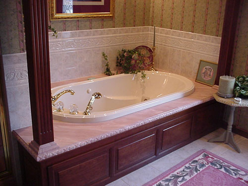 A custom bathroom. We designed, and did all trades on this job down to the paint and wallpaper.