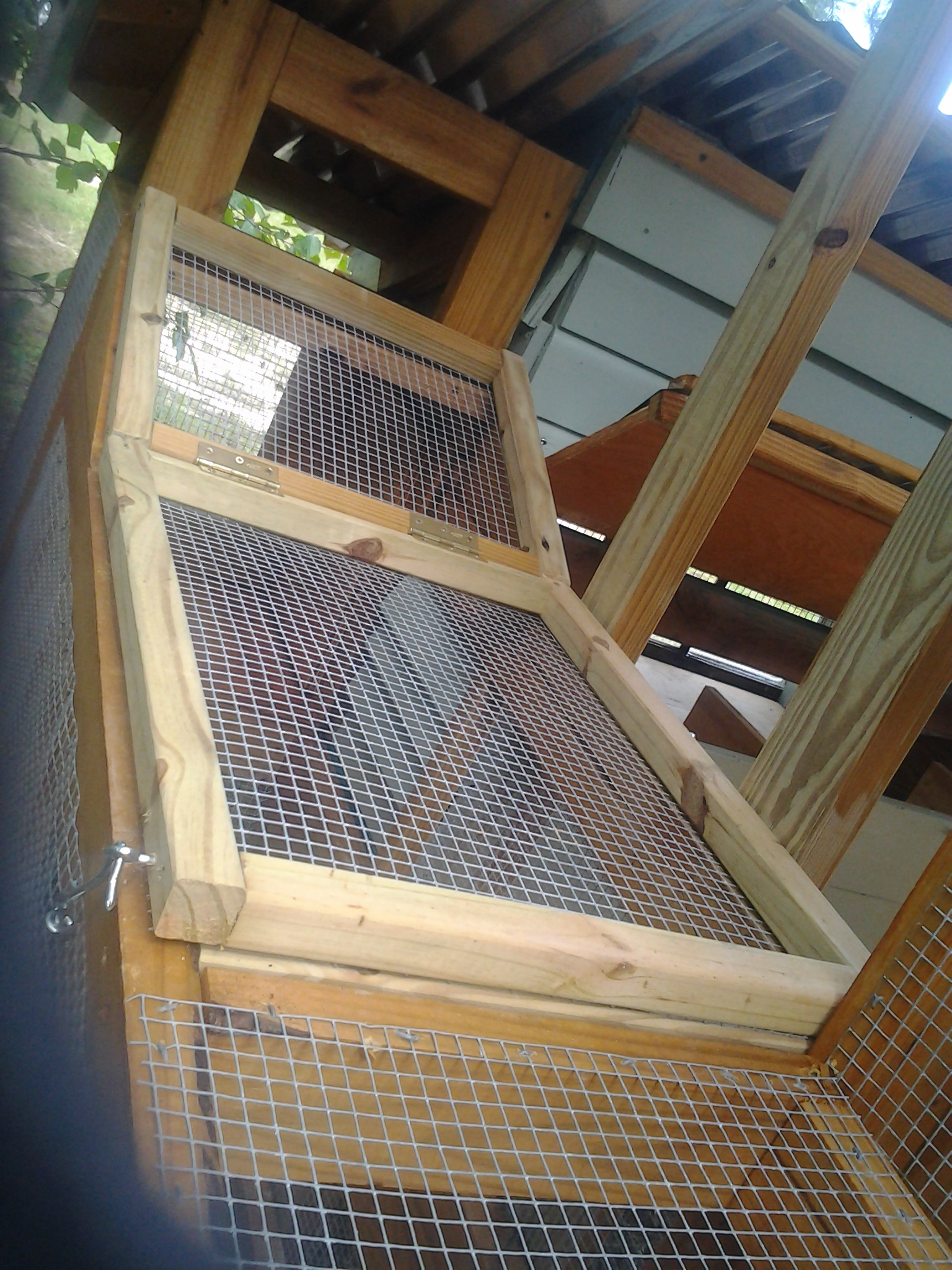 A door to access ramp and make cleaning easier.