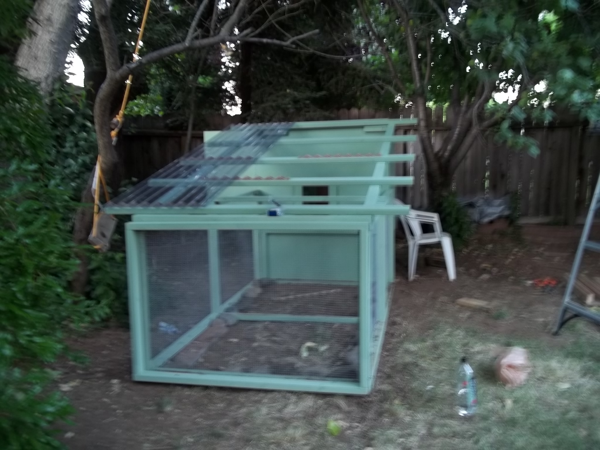 A front shot of the coop. Still needs the ladder, the remaining roofing, and some little things. She's shaping up nicely!