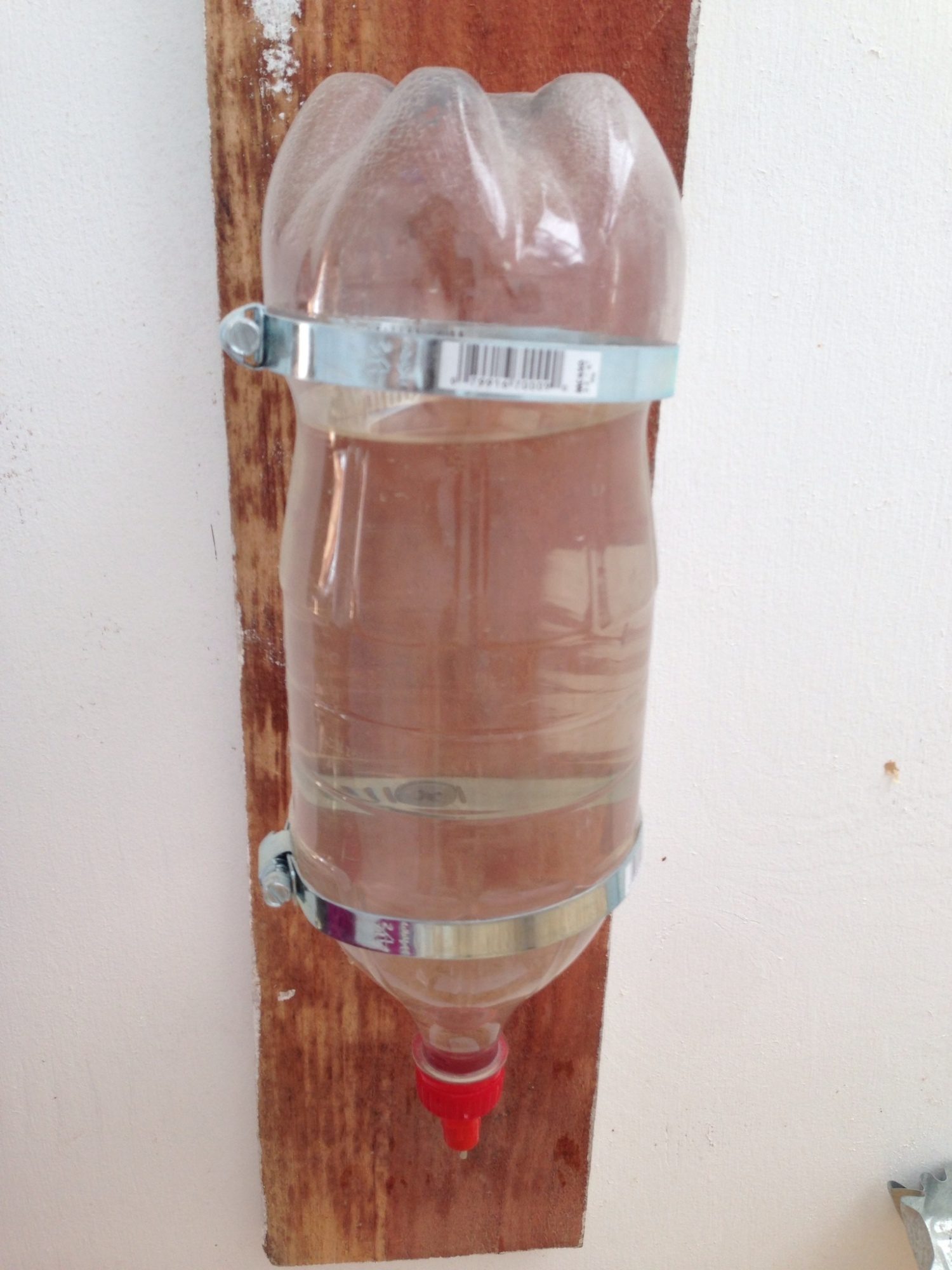 A good method to hang your 2-little bottle nipple waterer