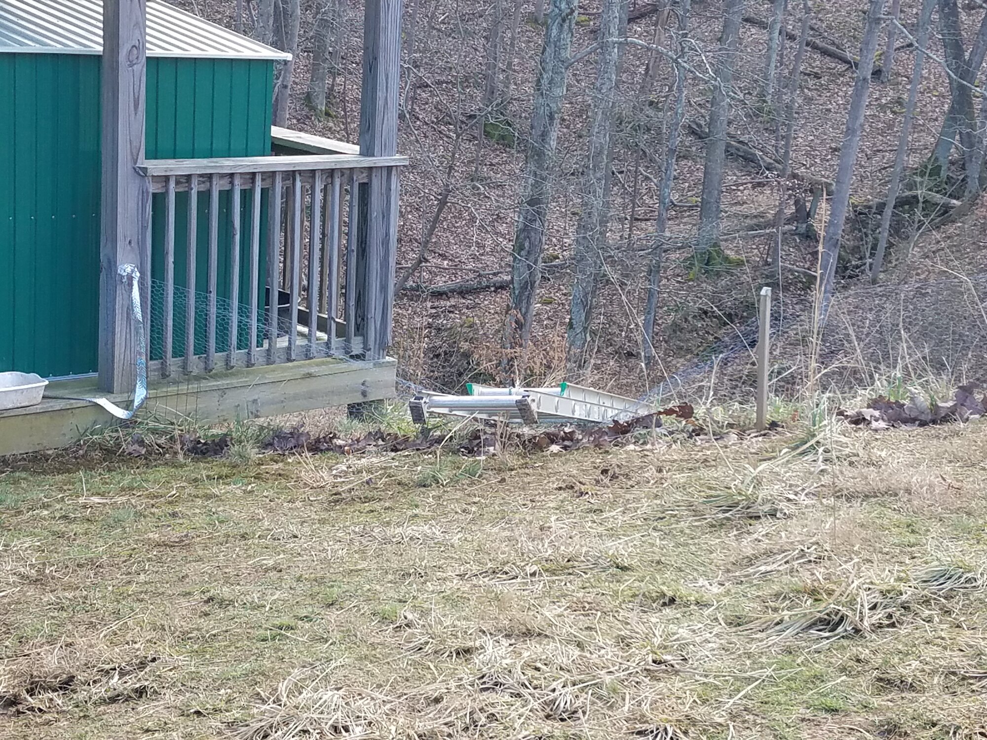 A ladder was blown over and fell into the fence