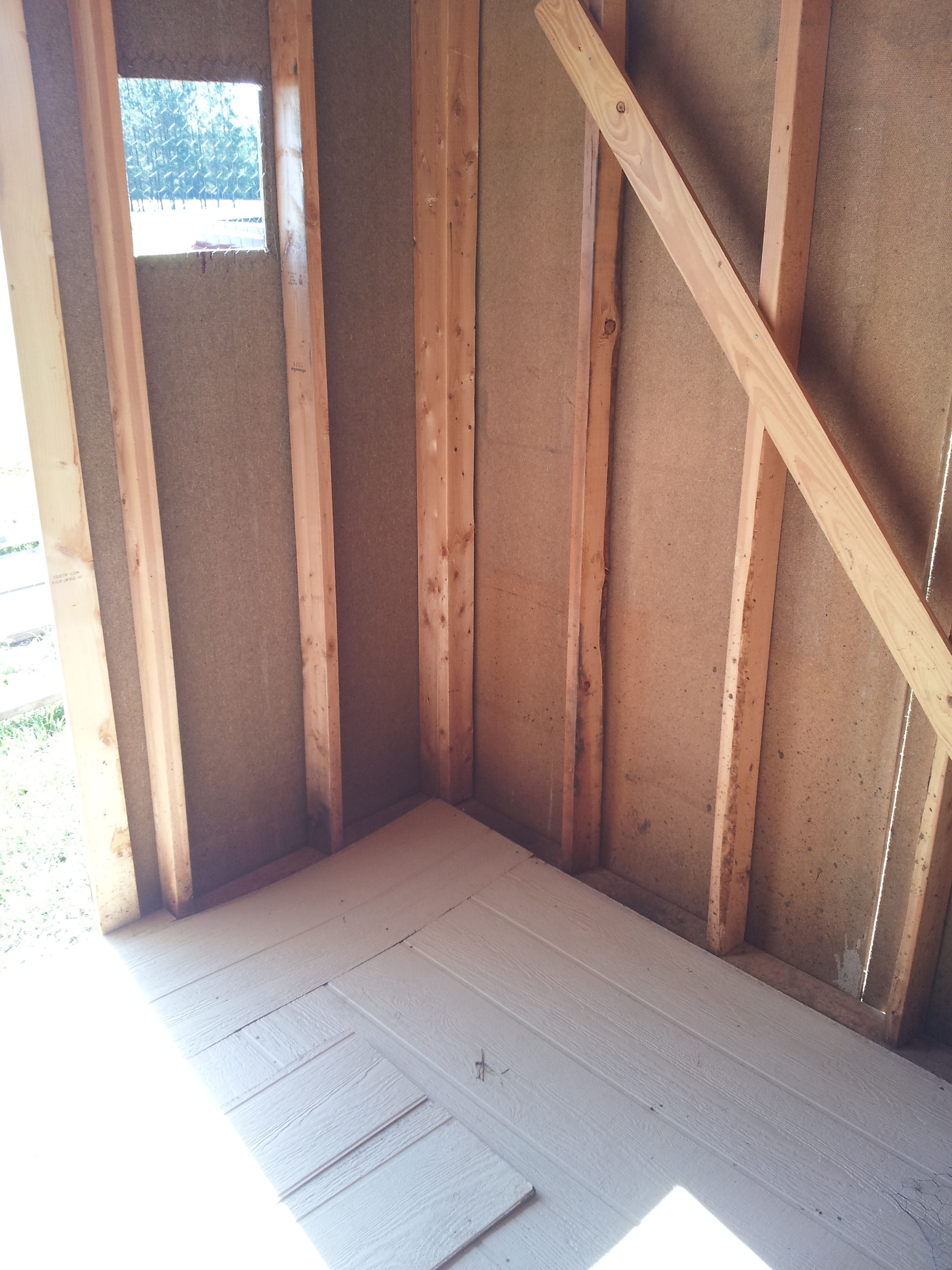 A view from the back showing part of the front door on the left.