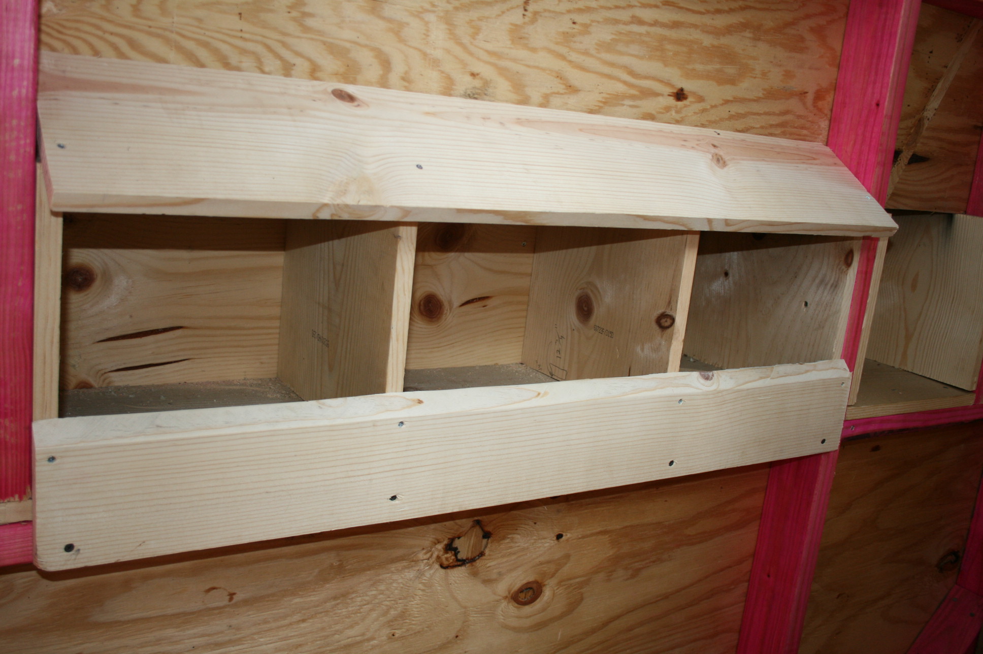 A view of the inside of the nesting boxes....the 4th nesting box is not finished yet and have to finish a few things, but getting there.
We just got our chicks in today, (5/6) so it will be a while before they can go into the coop. Hopefully by then, the coop will be completed and have electricity supplied to it.