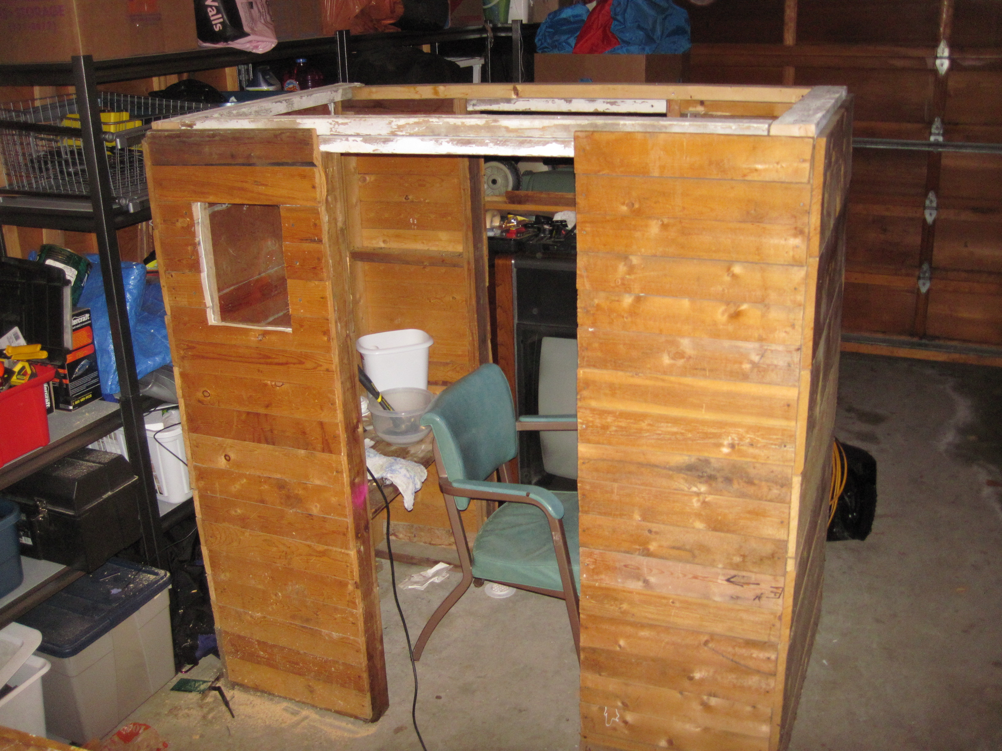 Added a window and joined the two shelves. Shhh don't tell the chickens that it's not square!