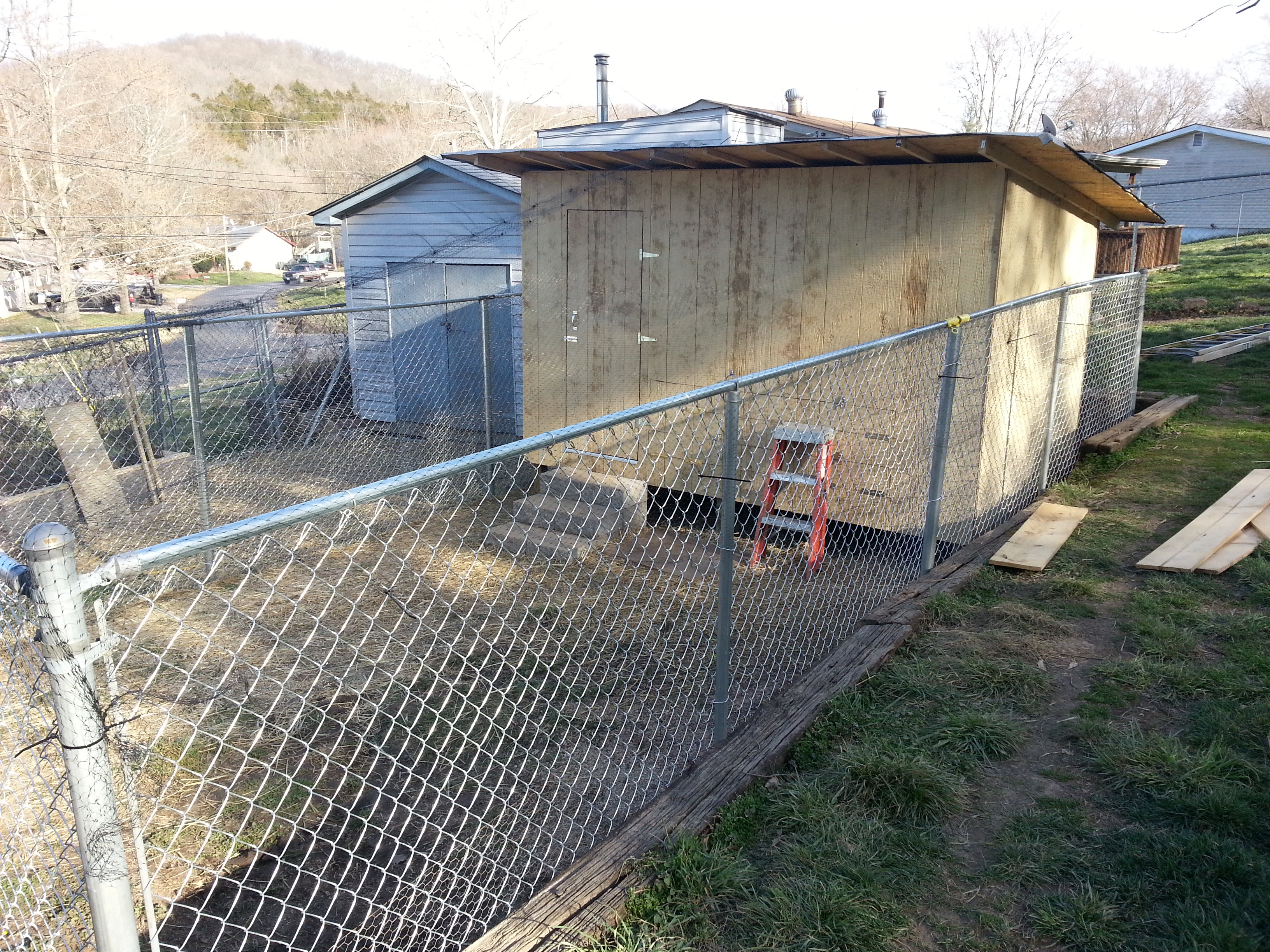 Added netting over the fence for mainly hawks I do not have any issues with raccoon's or opossums.