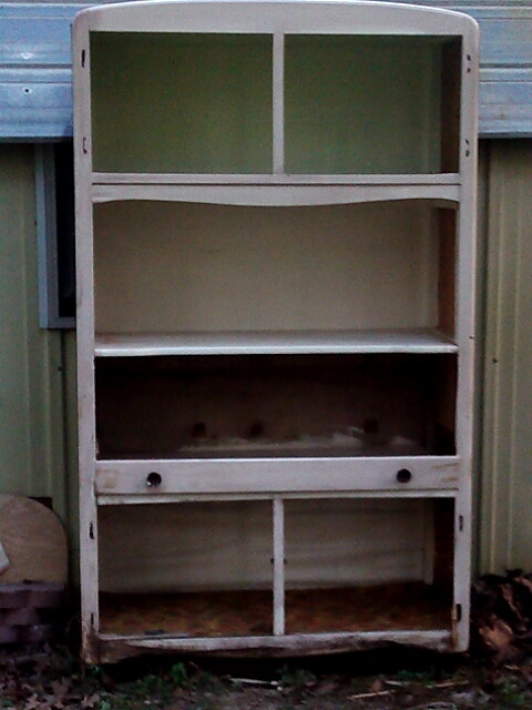 After tearing off all the broken/warped doors n sides, cleaned it...TA DA, its ready for hay and chicks to hang out in it