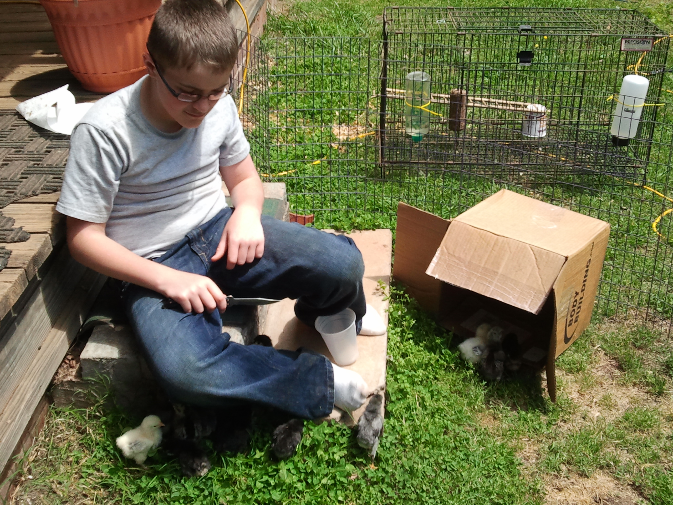 Alex and the babies outside