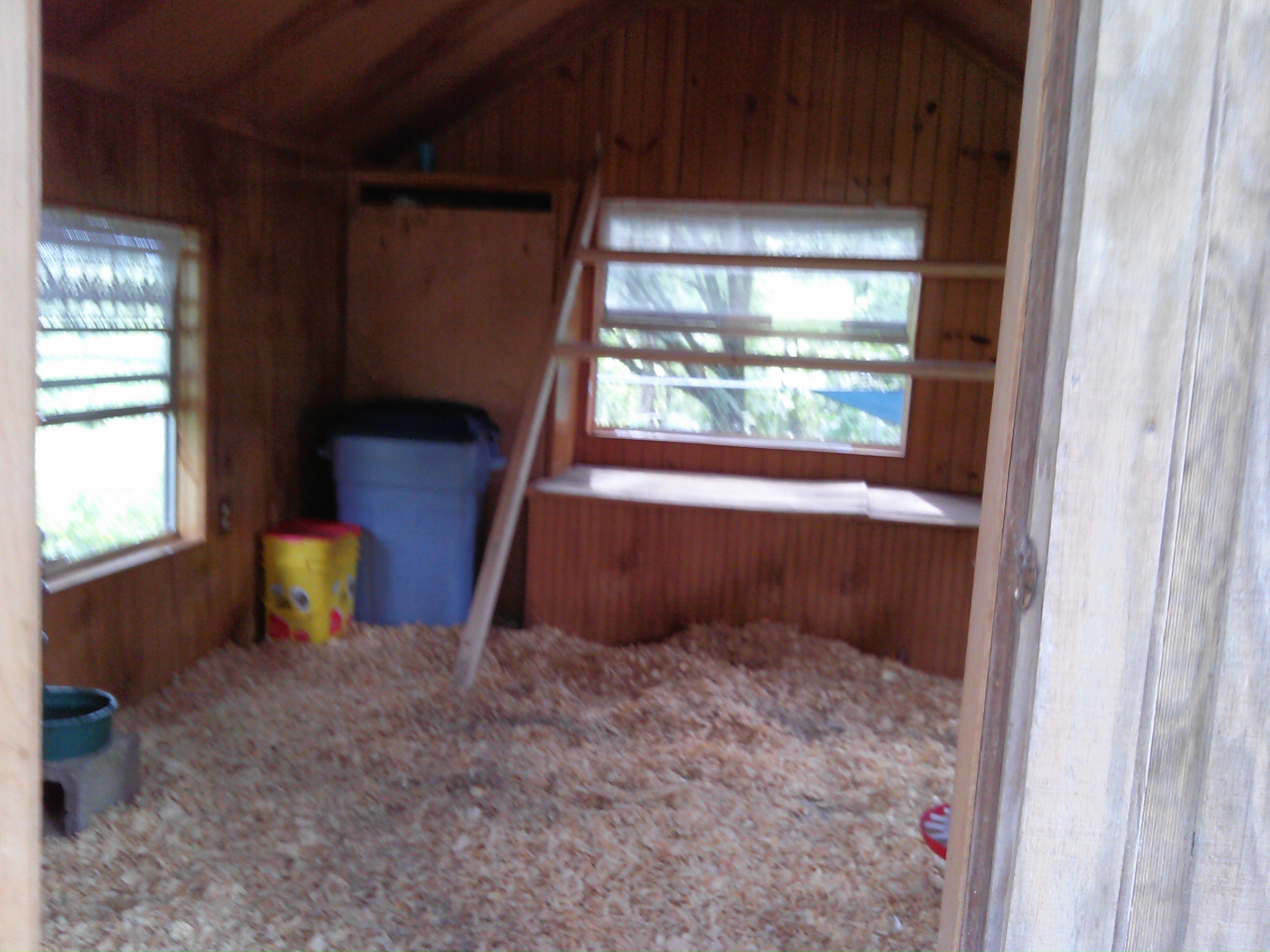 All done ... the food bin holds a board in front of the shelves. Left the valances on the windows ... now to add some decorations and it will be a cute little coop.