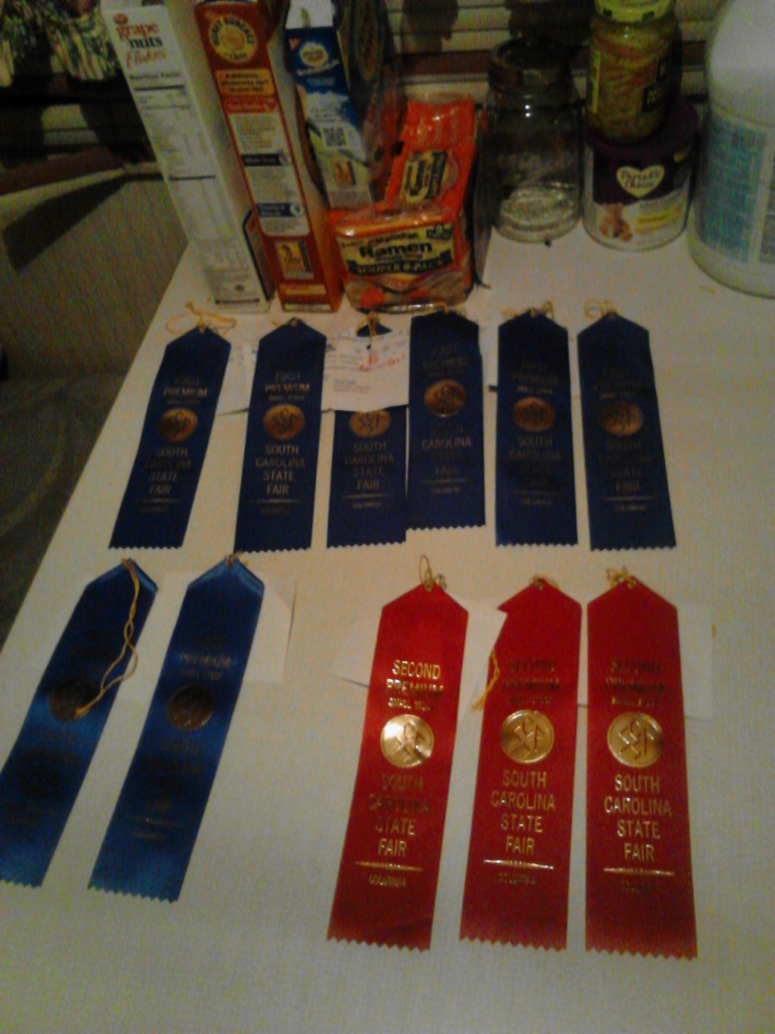 All the ribbons I won. I entered 12 birds. Got 8 1st place, 3 2nd place and 1 dq.