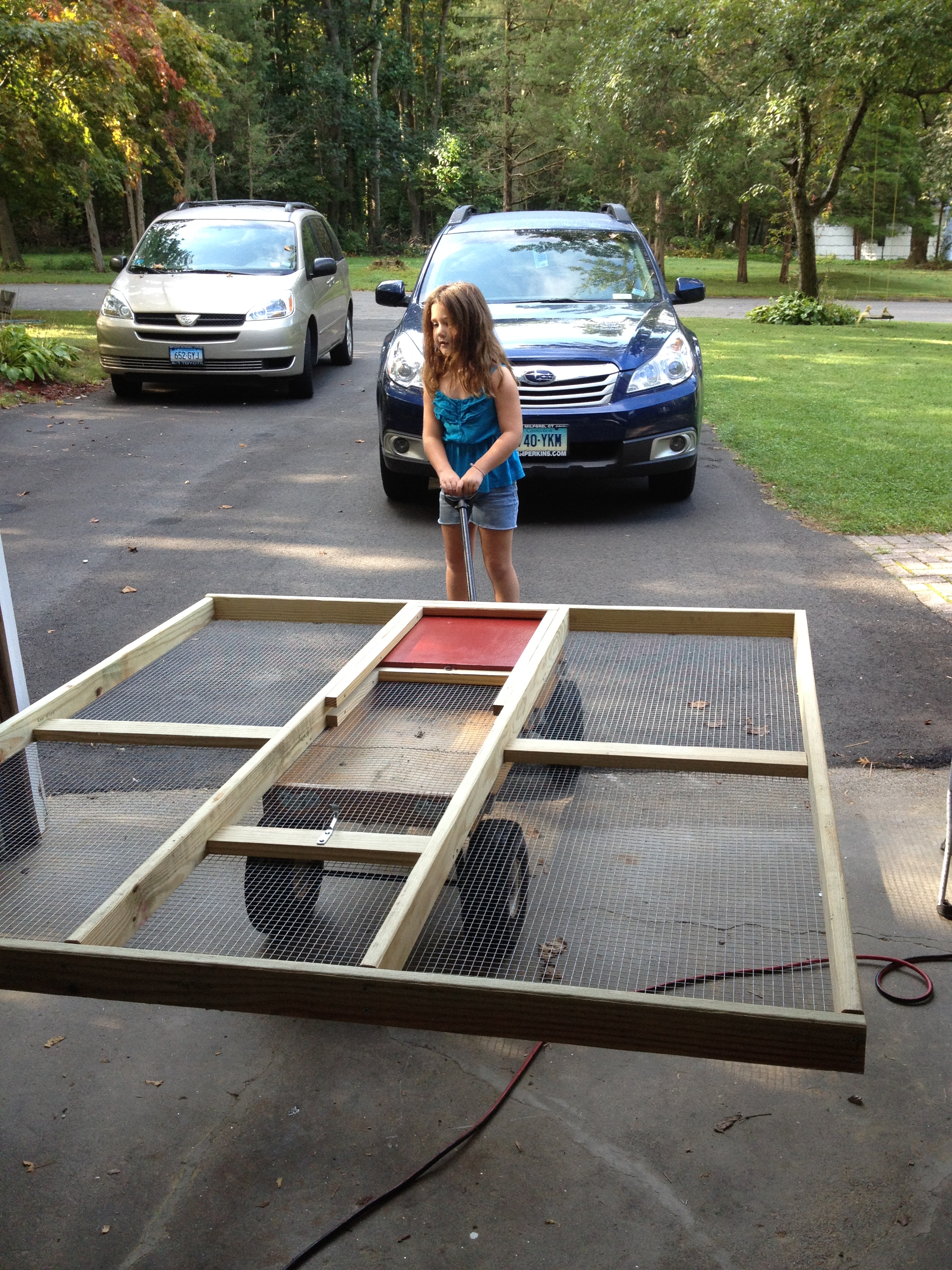 Aoife helping pull out front panel of run