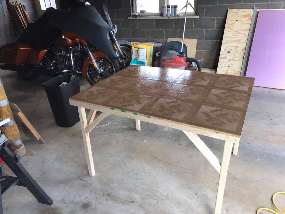 Base covered with vinyl tiles to help with cleaning.