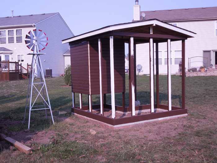 Base structure built, ready for fencing. Still have to cut the holes for the windows and pop door and get the ramp put in.