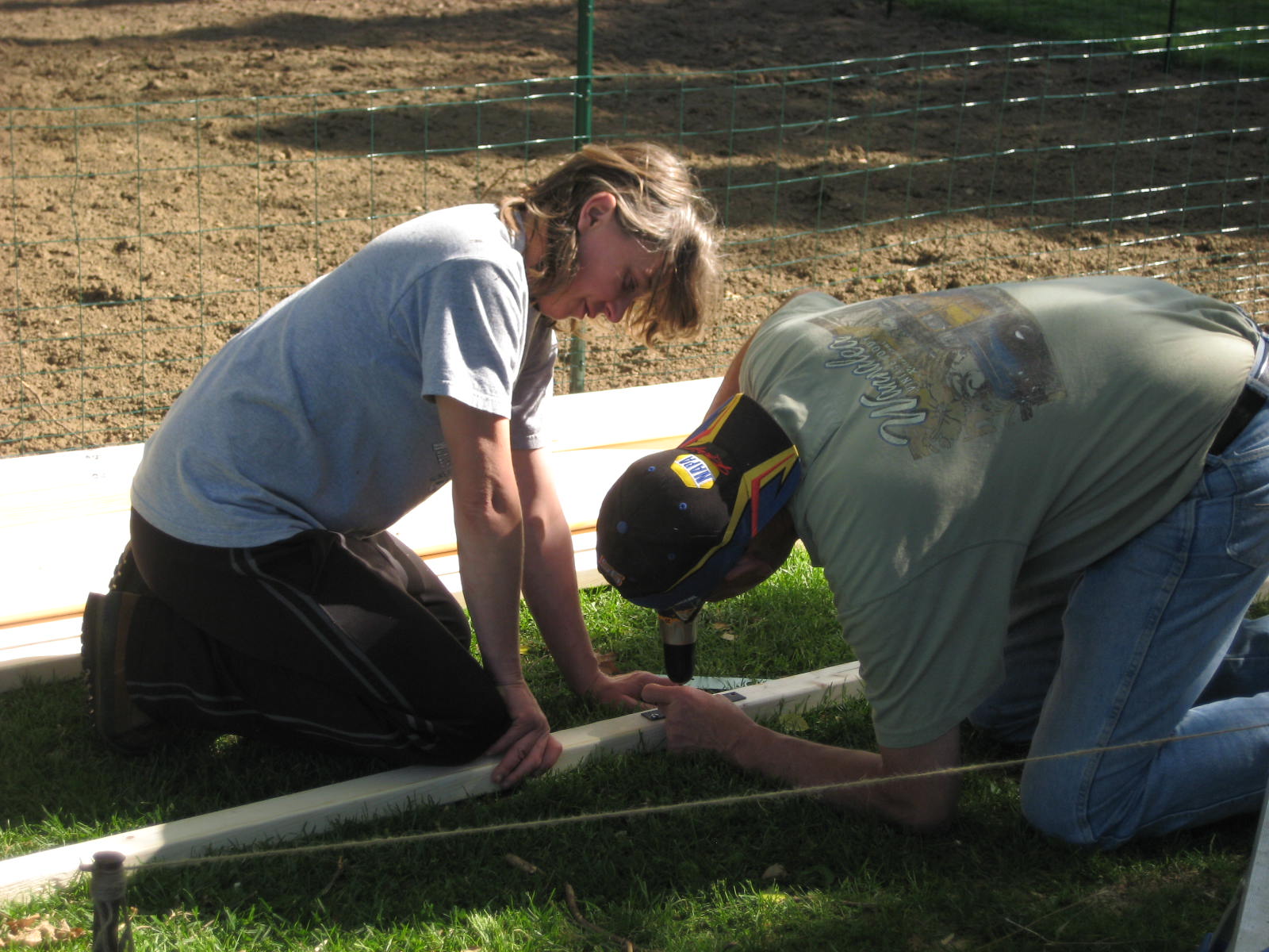 Bob and Tonya hard at work building the pen