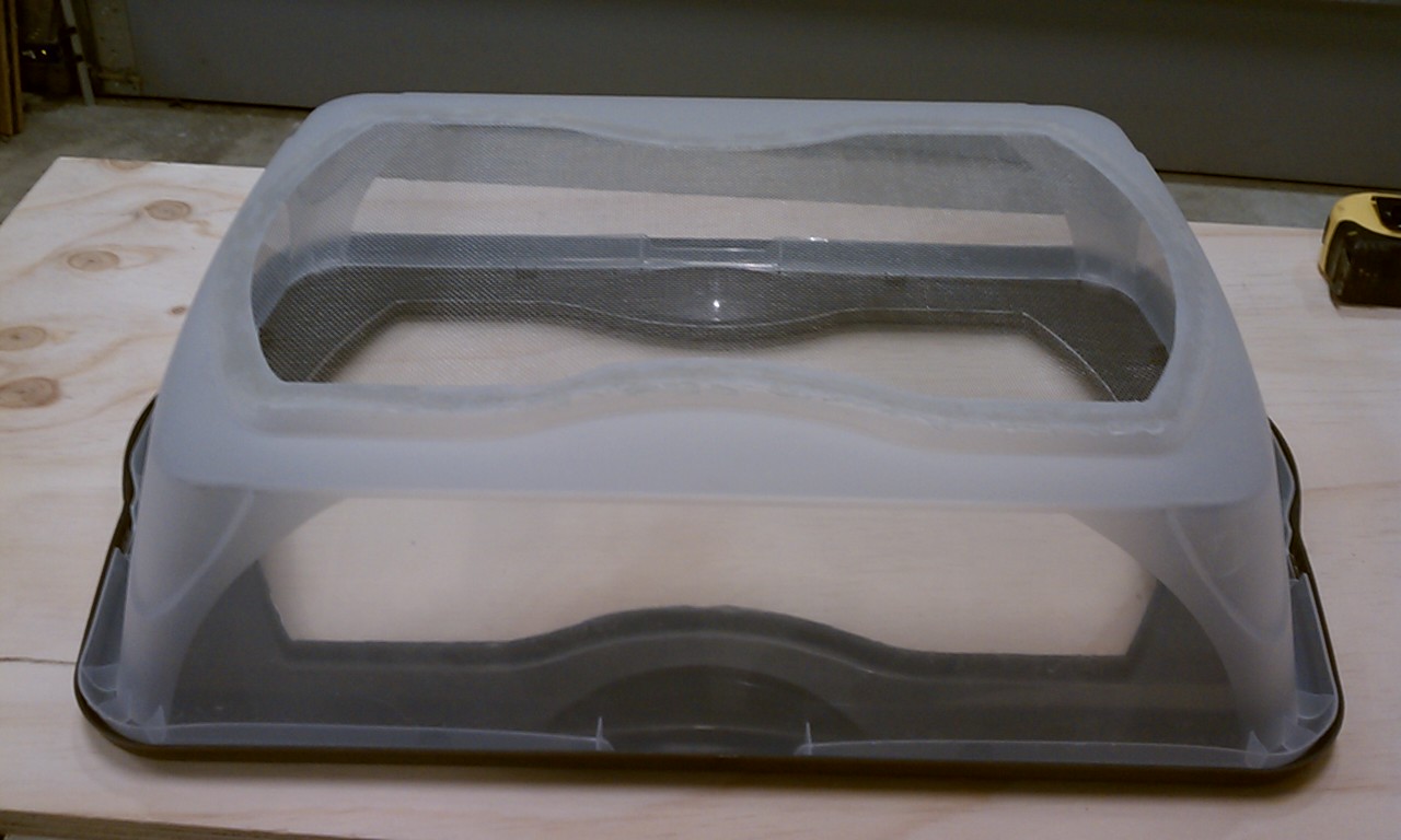 Bottom of the second bin with the aluminum window screen that I hot glued into place.
