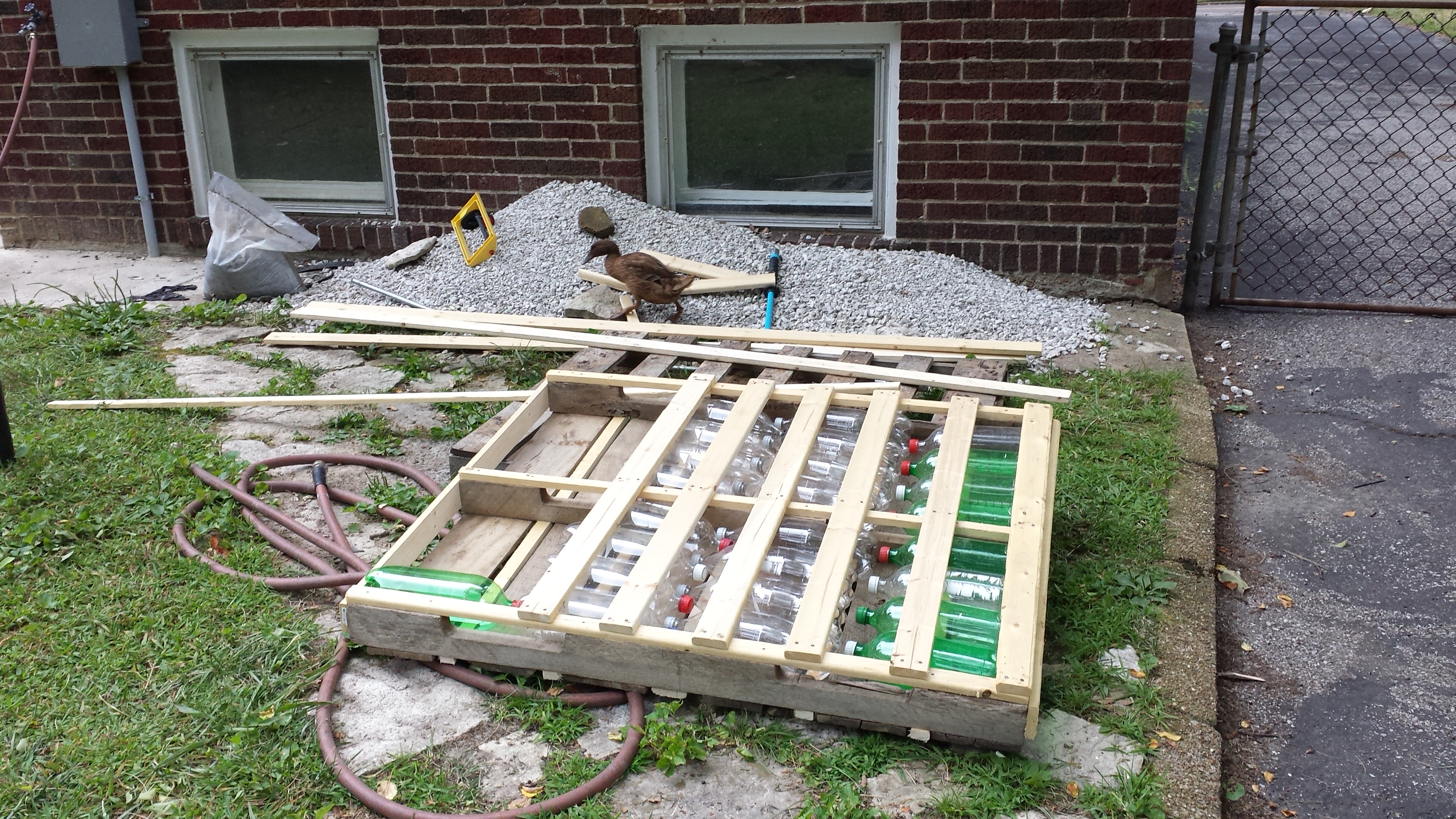 bottom view of soda bottle/pallet dock almost complete