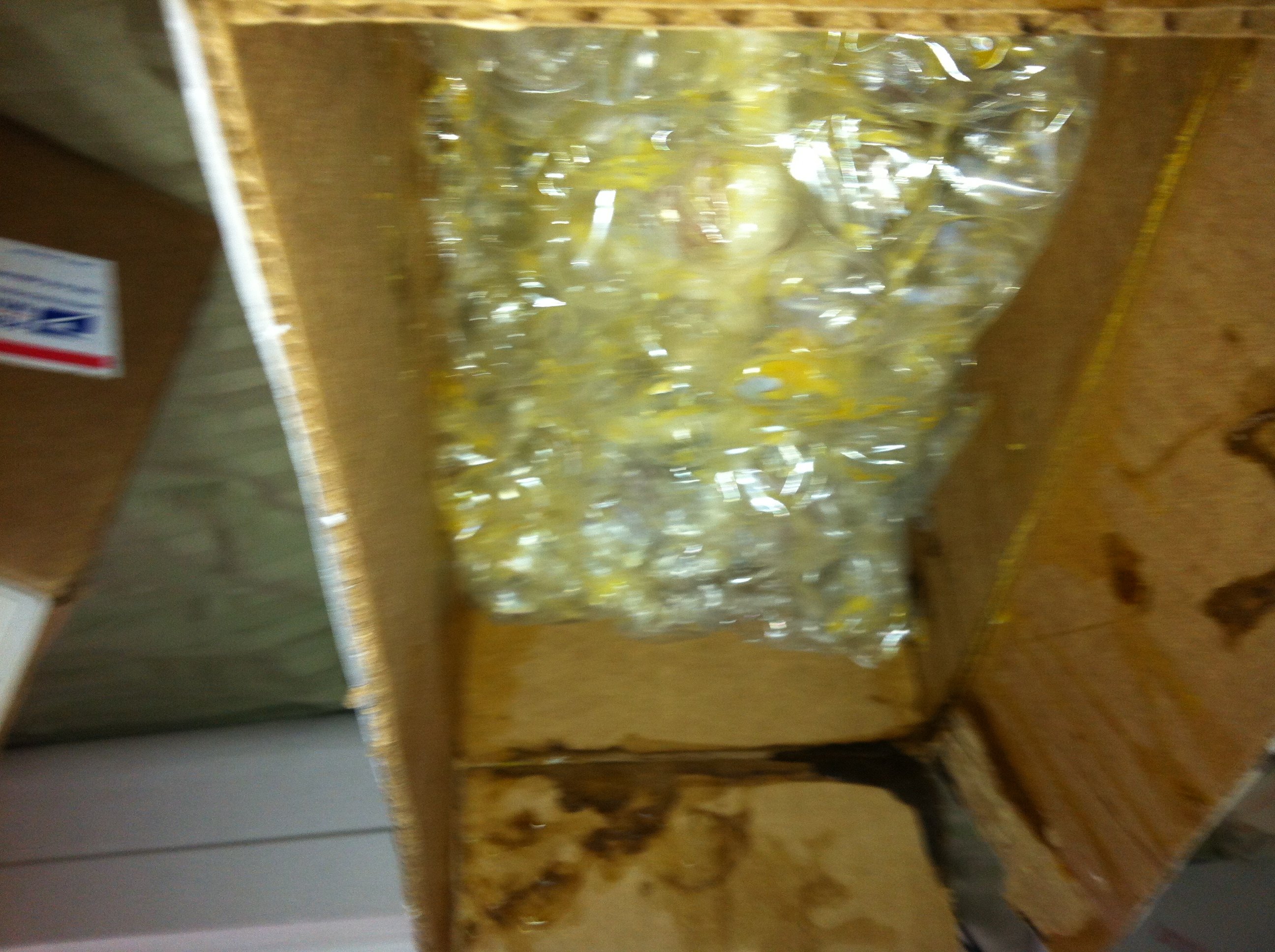 Box with too much extra space left, so the eggs were bounced around inside.