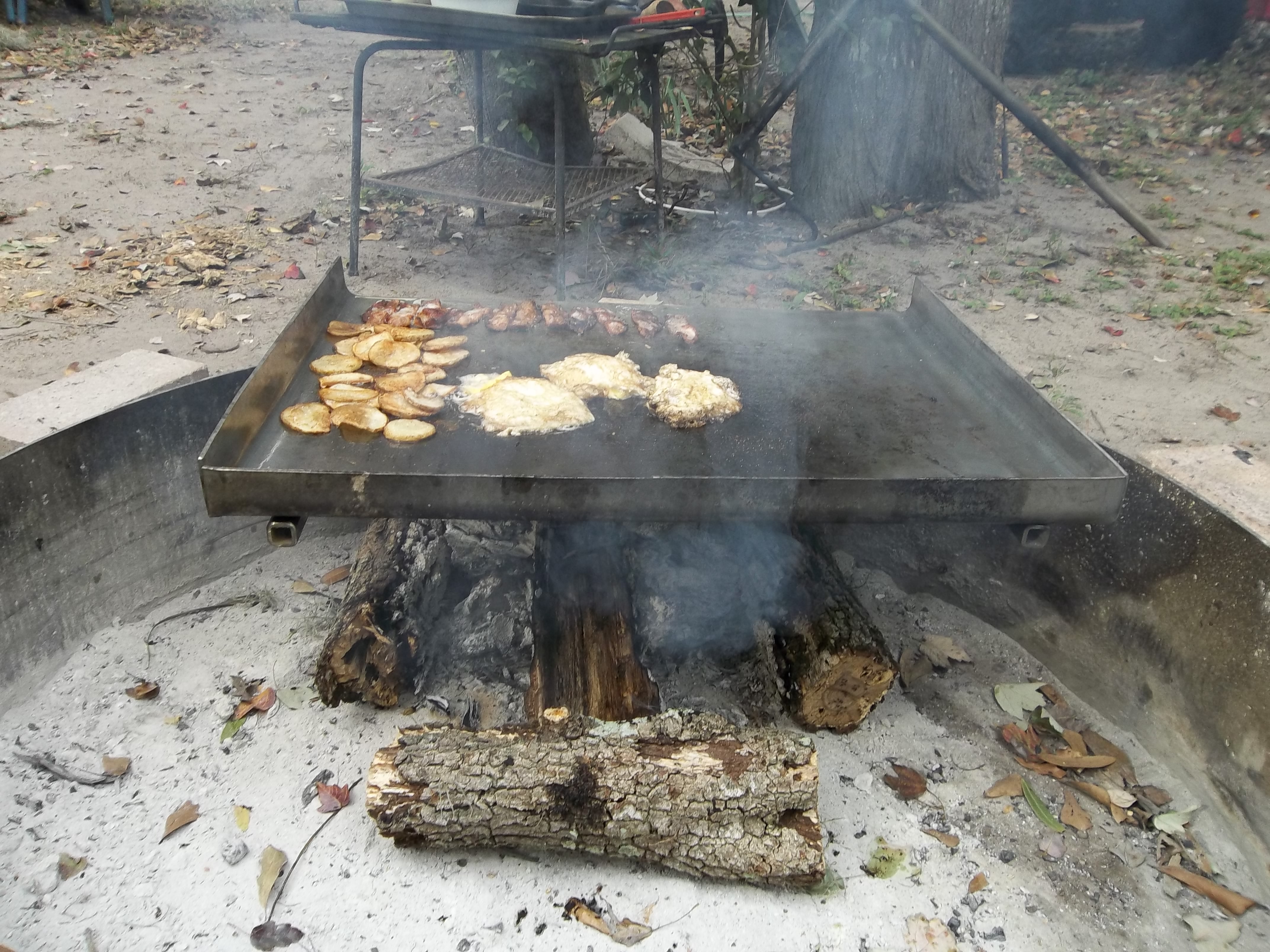 Breakfast cooked outside over the fire ring..Yum!