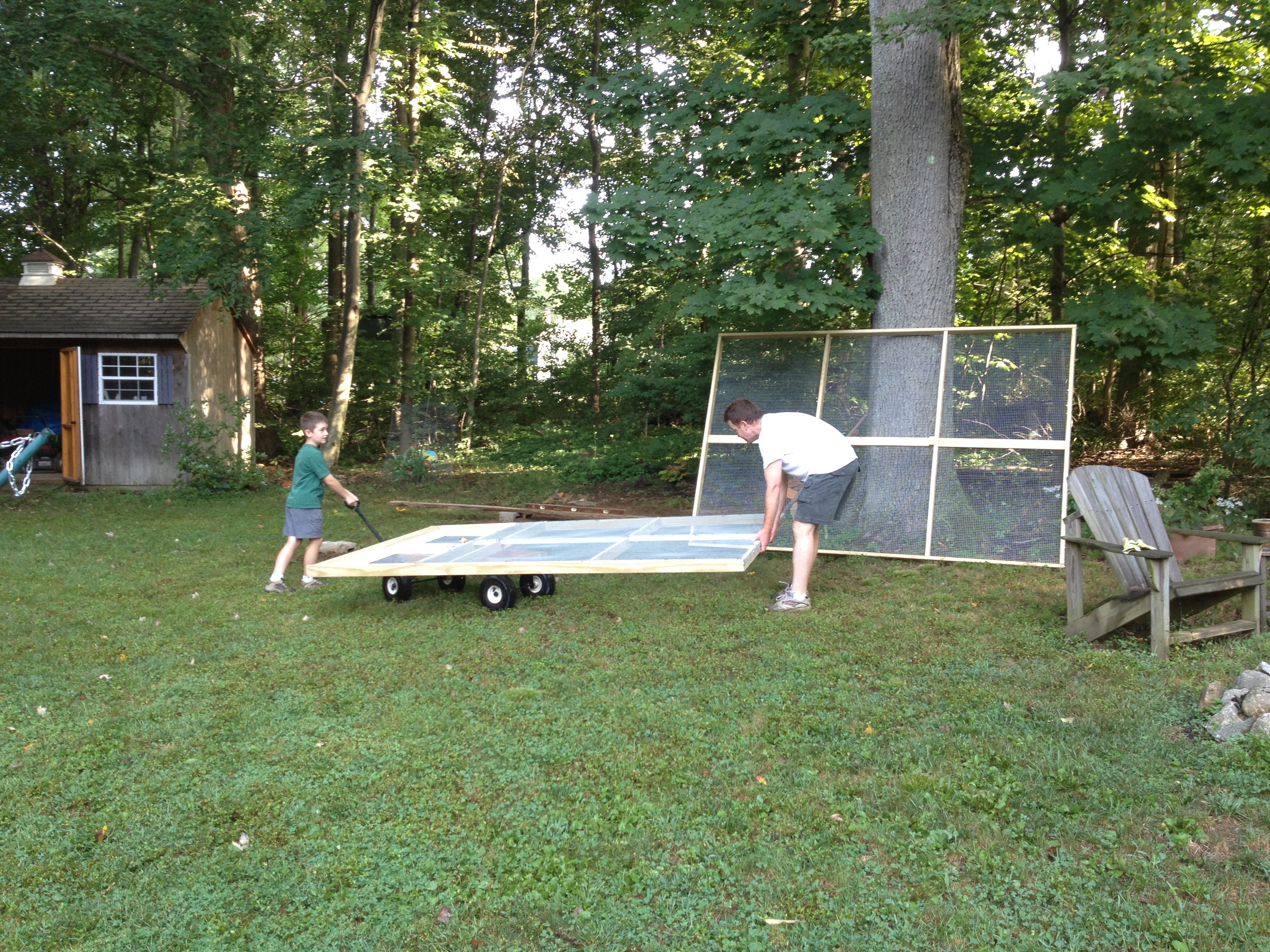 Bringing sides of run out into the yard on our wagon