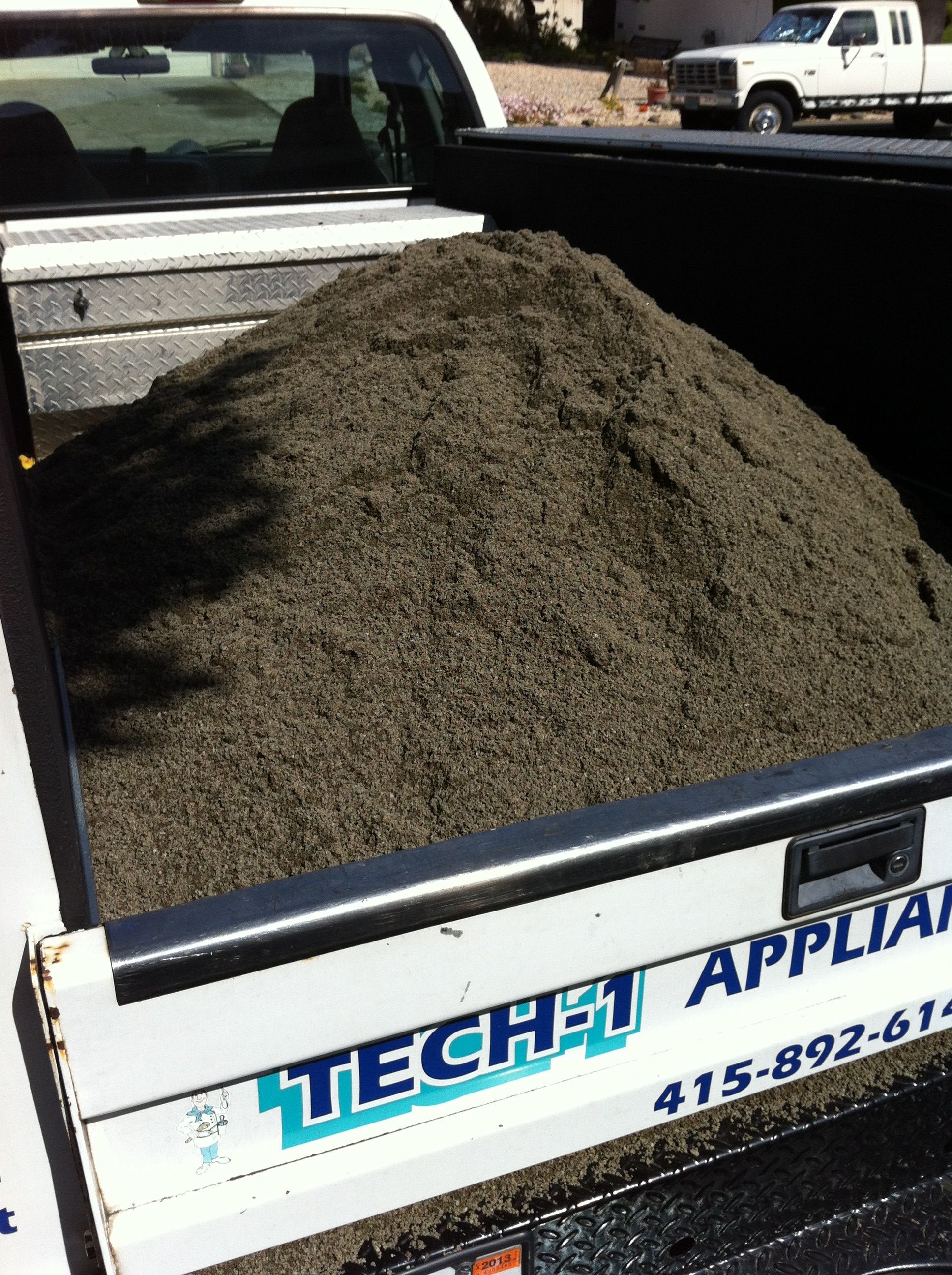 Brought in 1 yard of river sand.