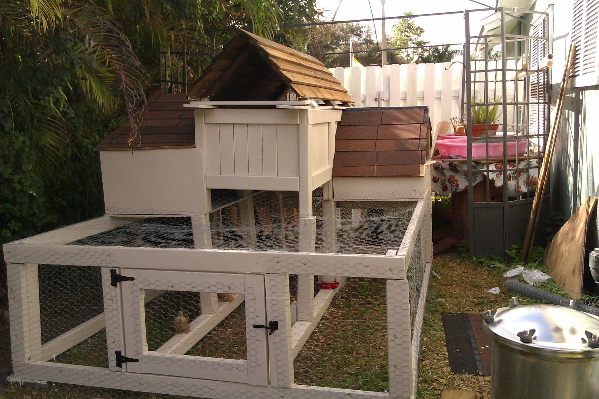 Built on a wing and a prayer with 90% recycled trash treasures, with lots of inspiration from all of your beautiful and practical coops. Currently house 3 bantam cochin pullets, and 4 silkies under 3 mths old.