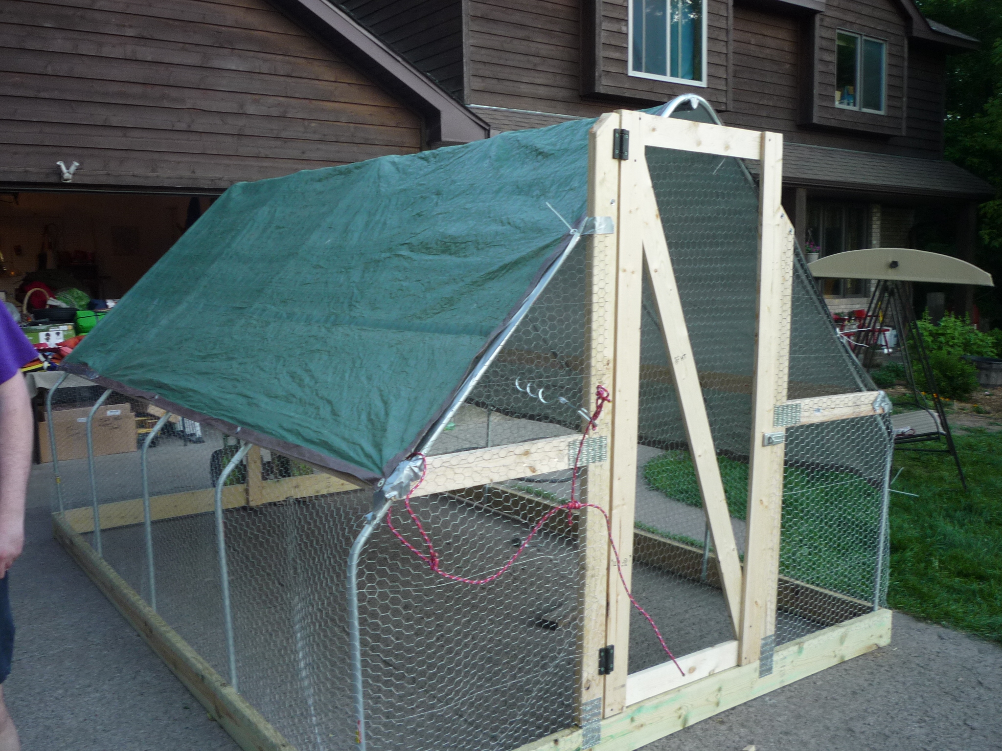 Capped off with a 12'x16' tarp and the coop is finished and ready to be moved to pasture. Just add chickens.