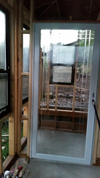 Check out this awesome (human) door into the coop!  Found this at a 'had-to-buy' closeout price.  Yes, it's a bit fancy for a shed but hey... adding a little class here, lol.