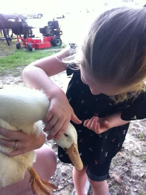 Cheyanne loving on her duck "Quack"
