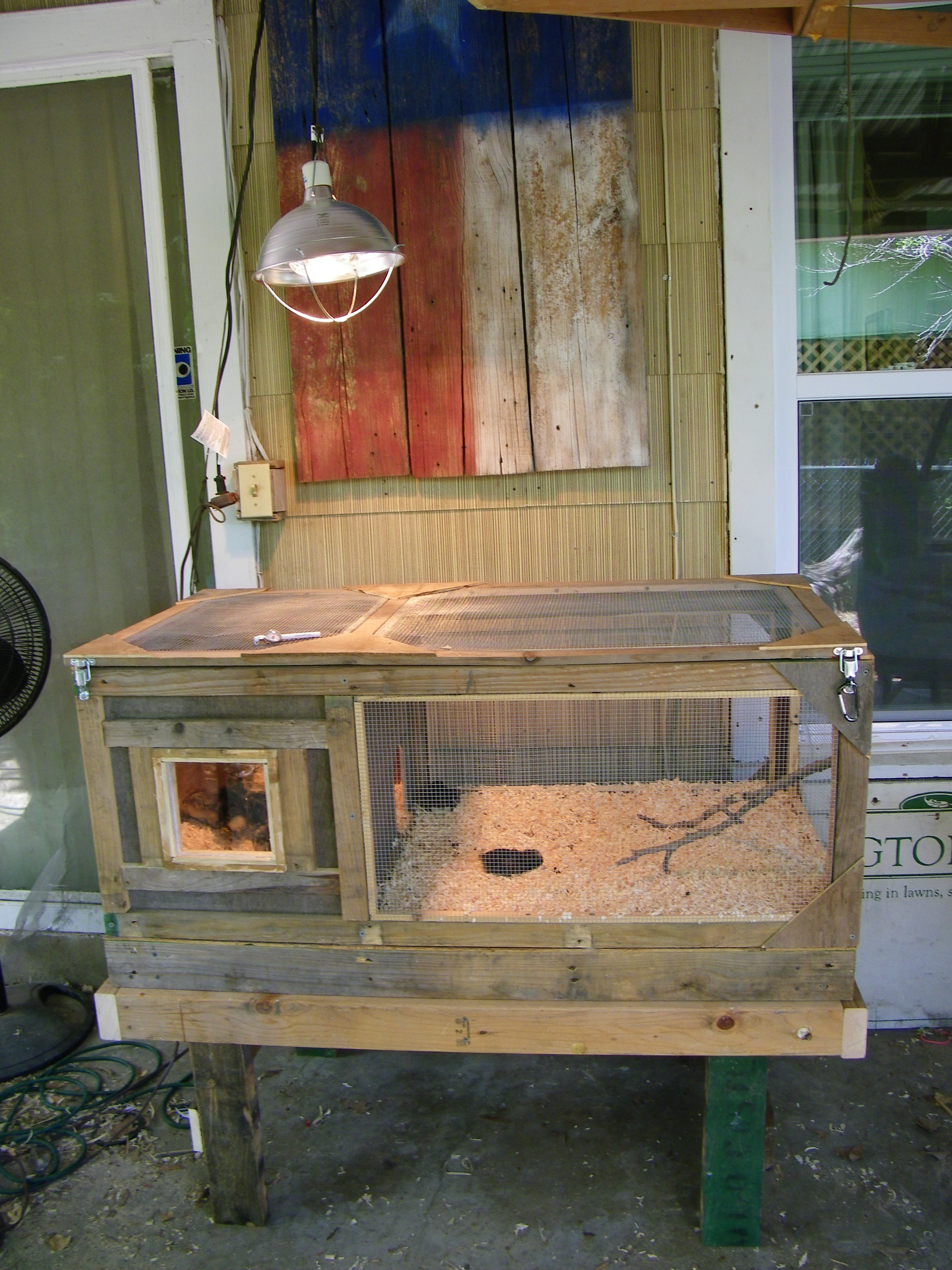 Chicken brooder with stand.