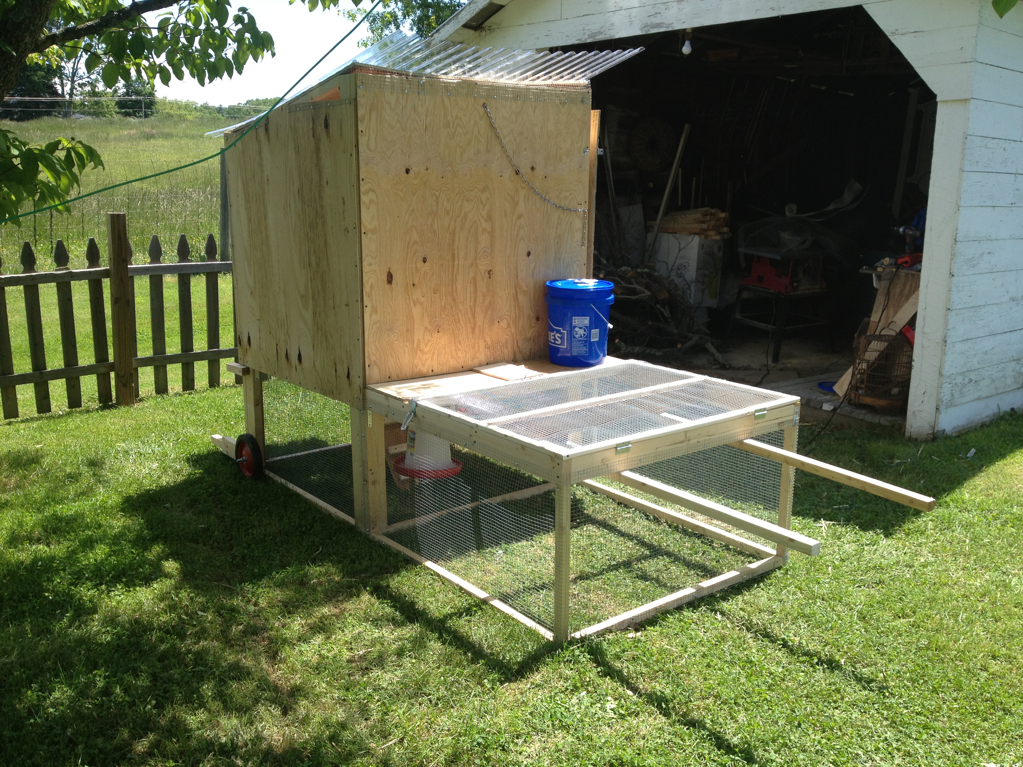 Clear roof on to allow for light through skylight and water system attached, last of chicken wire attached.