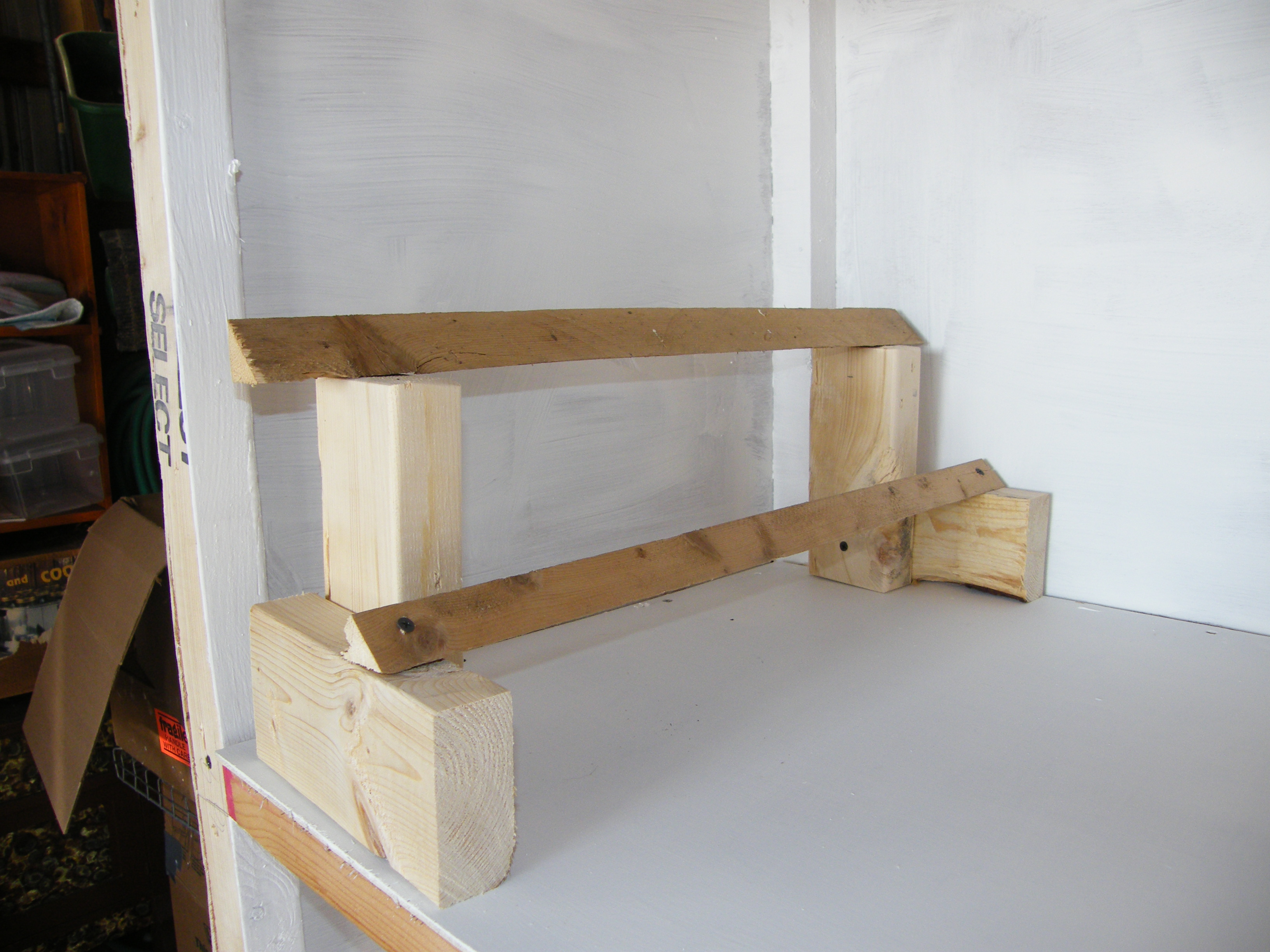 Close-up view, very simple.  the roost is actually trianglar  and I may yet go snad that down to round it.
