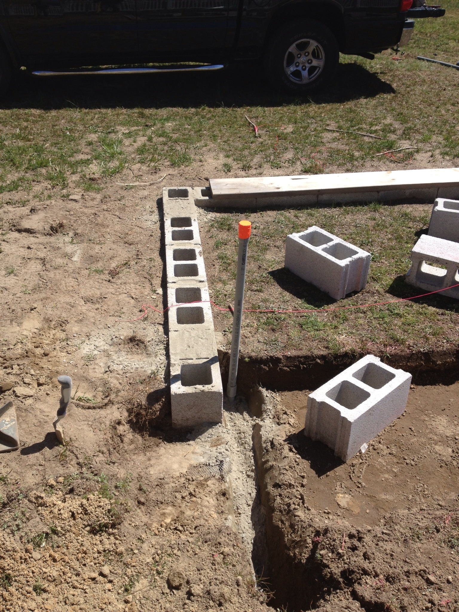 Concrete block foundation, lath wire buried all the way around with 1