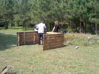 Construction begins.... I collected these pallets from the family that gave me the two "church" chicks (now known to be 2 of my comet hens).... 7' x 3' each.... I am trying to salvage things and not come out of pocket with with so much cash!!  *fingers crossed*