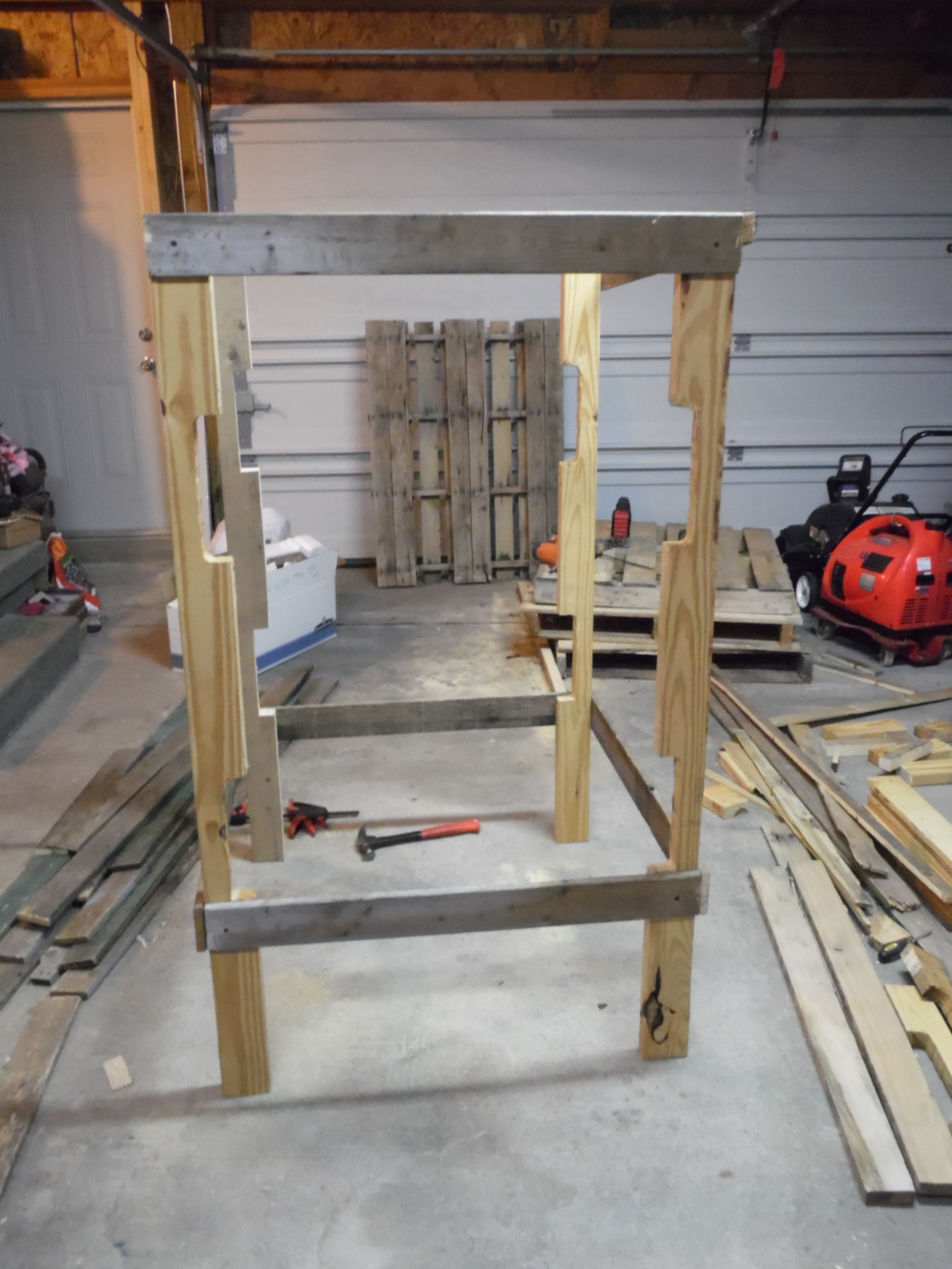 Construction under way. 90% of the wood used was recycled or scrap. Started it off with pallets