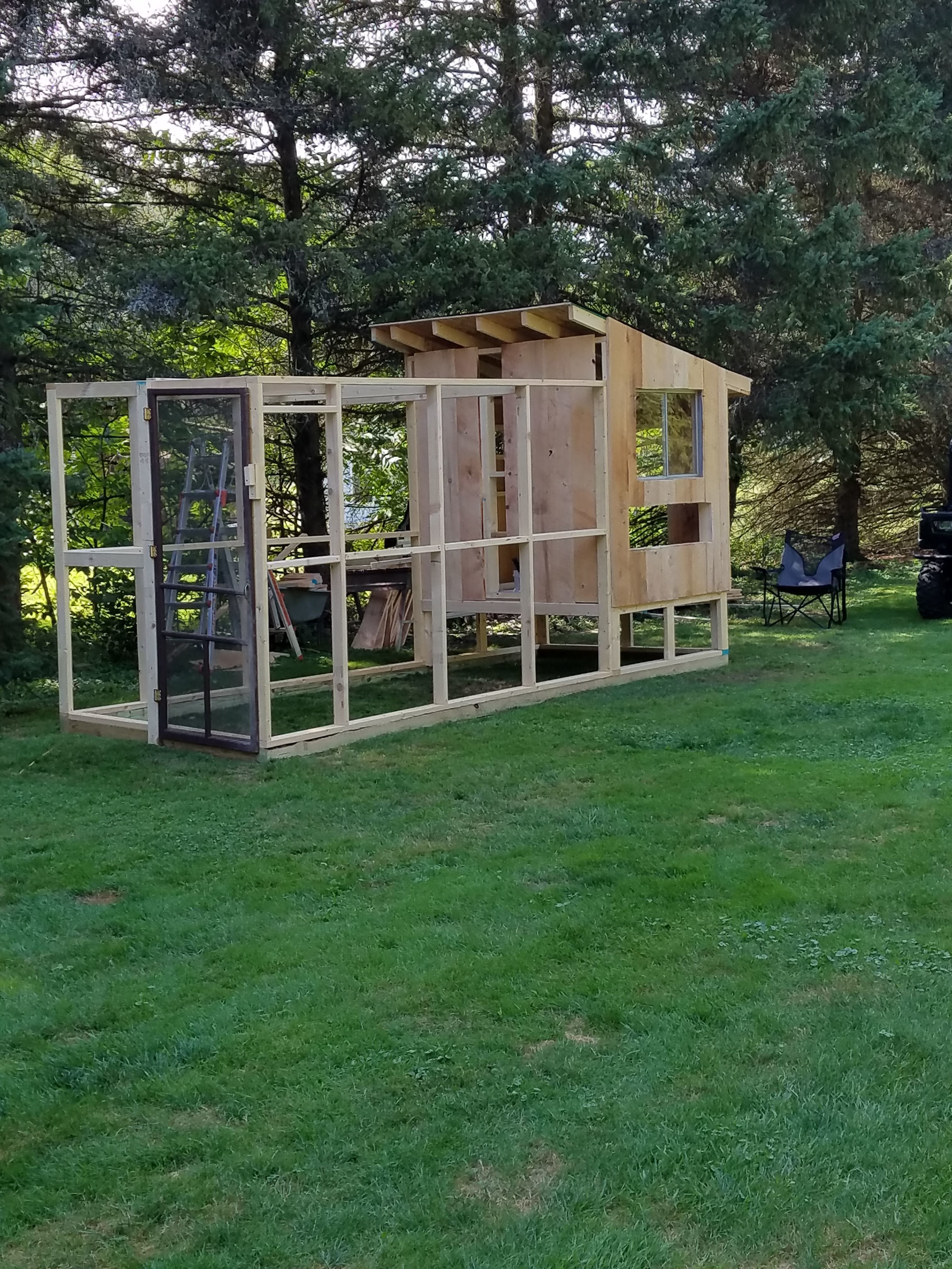 coop and run under construction, the coop is 6 ft. wide x 5 ft. long, the height in the front is 6 ft. tall and the rear is 5 ft. tall, the run is, including under the coop, 16 ft. x 6 ft. and about 7 ft. tall.
