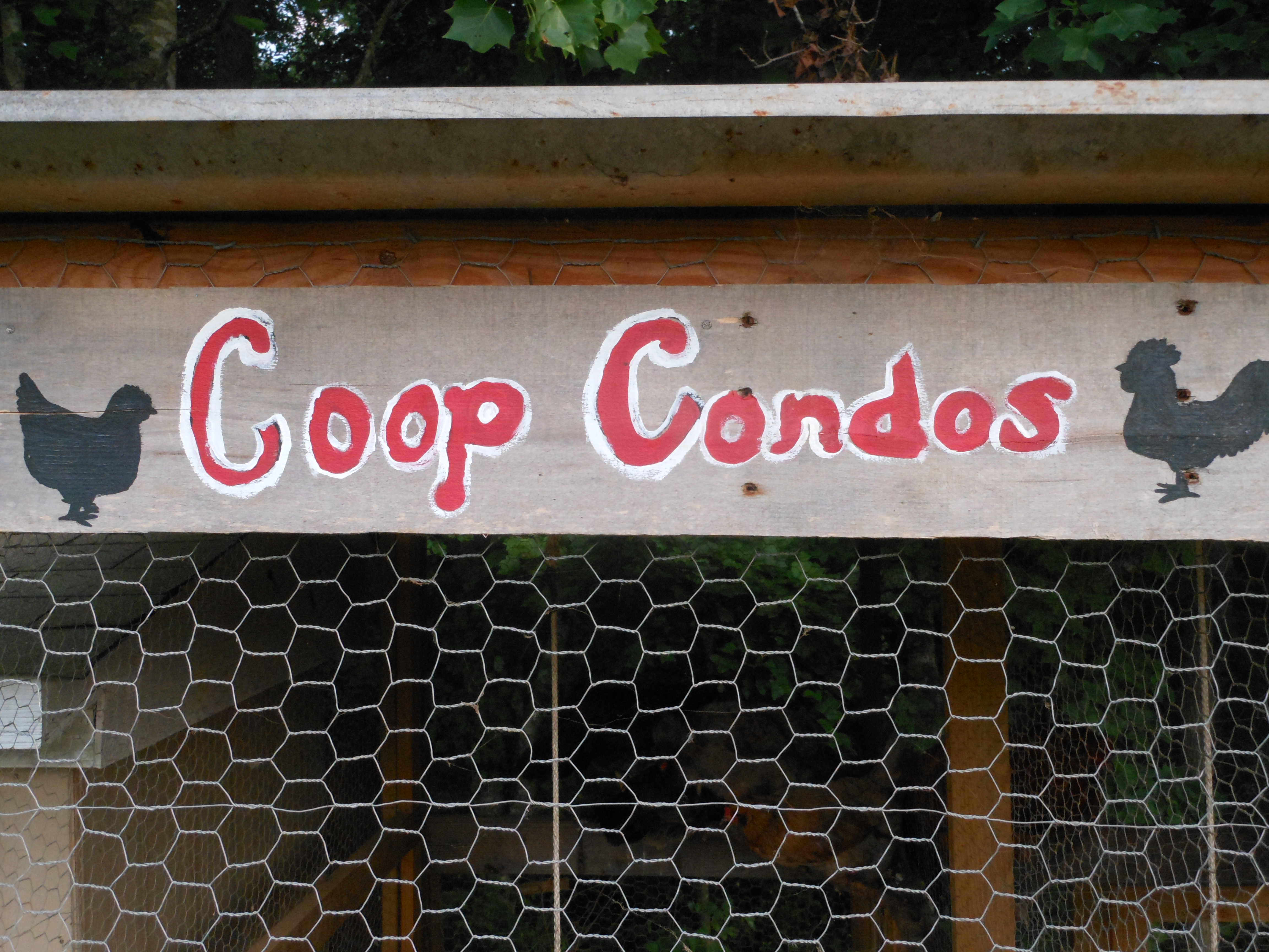 Coop Condos "welcome" sign