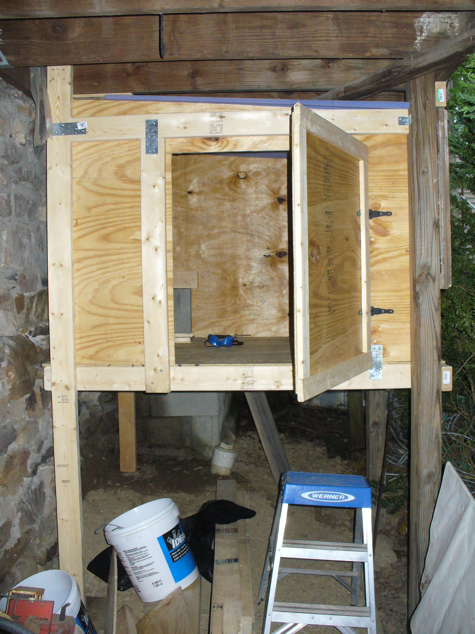 Coop done. Note to self (and anyone reading) ... don't try and build a coop on existing (twisted, not uniformly spaced...) deck posts ... made it up as we went along.