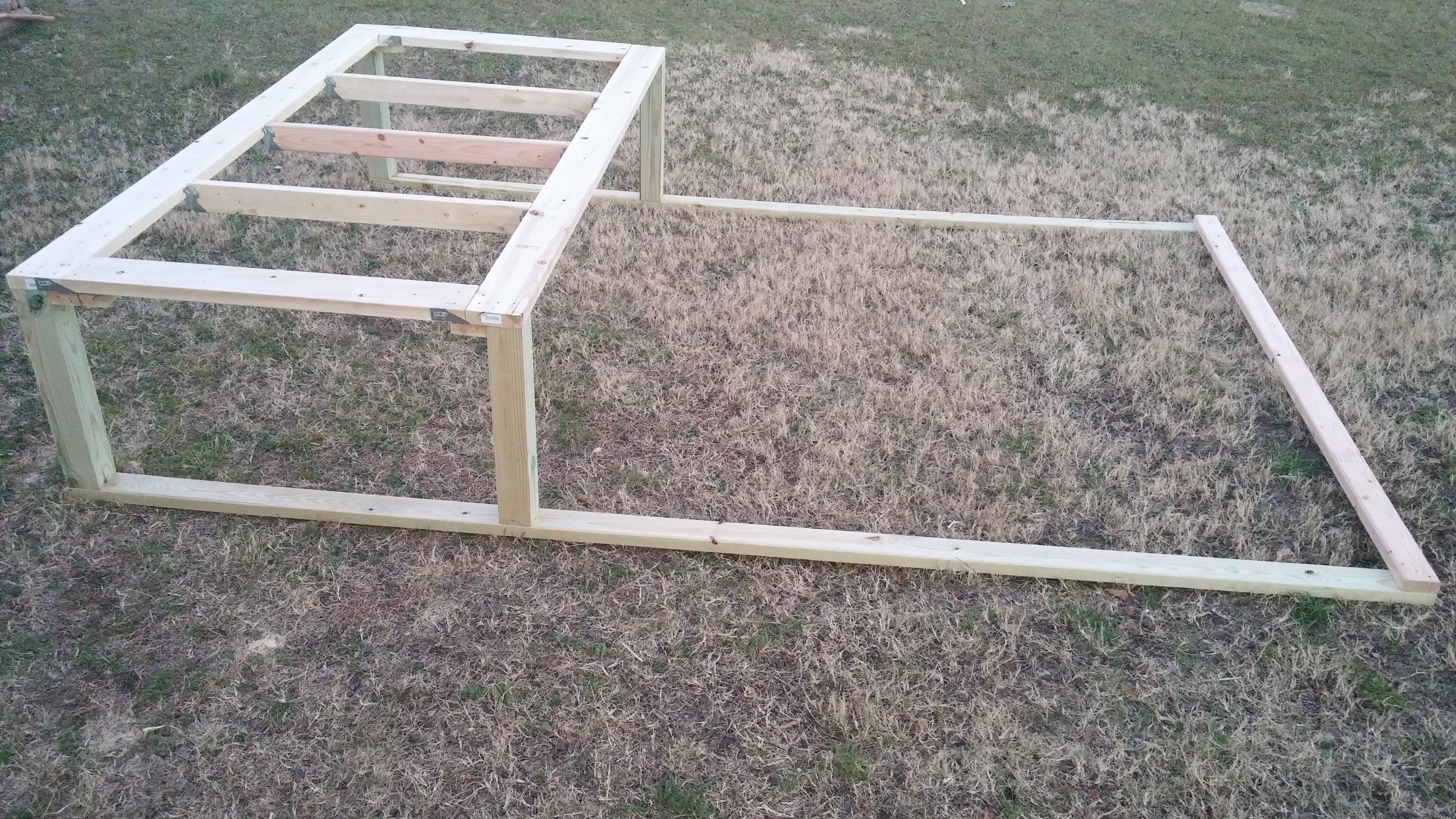 Coop floor frame with treated run base.