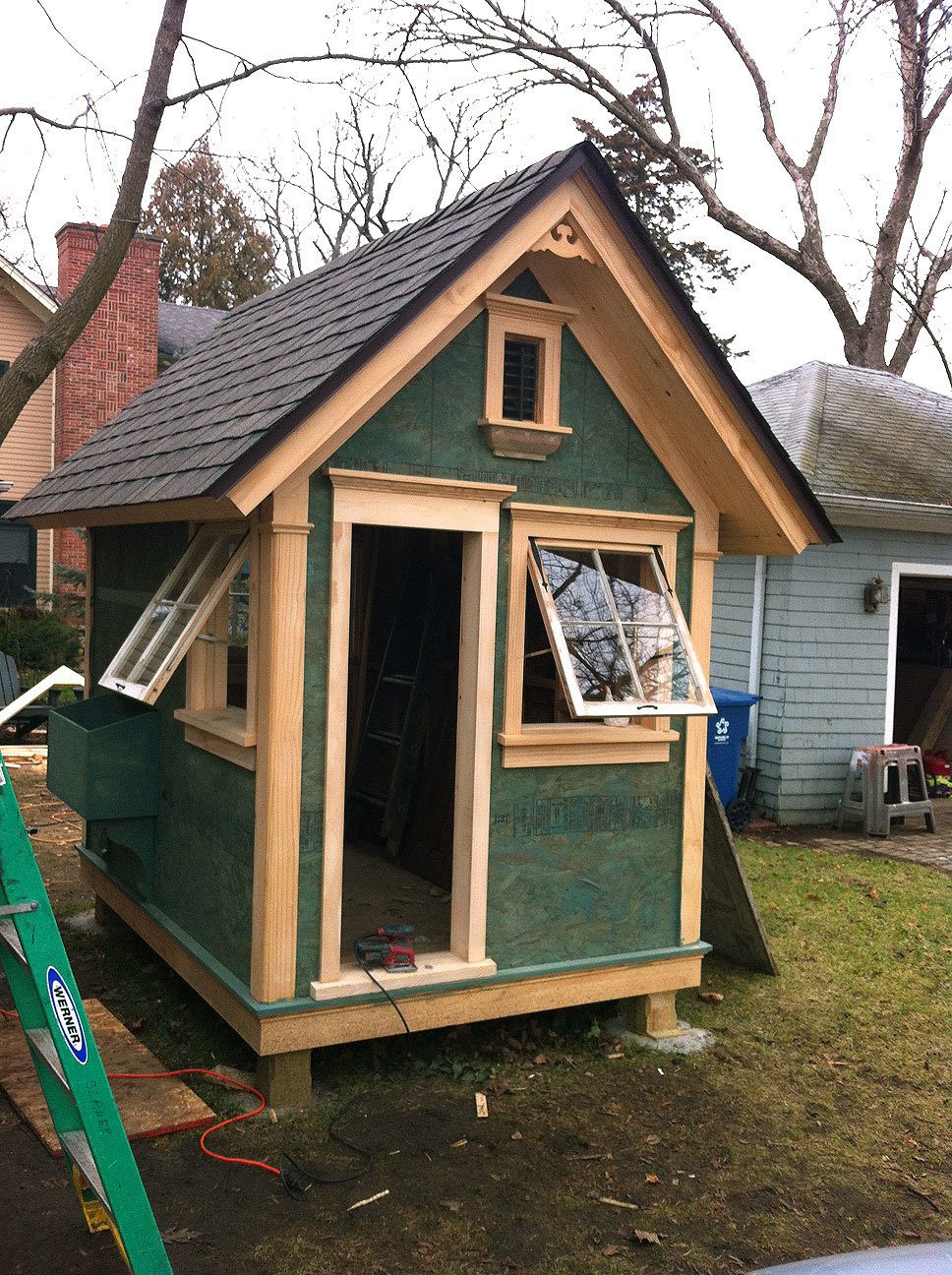 Coop to Date 12/20/2013. Plywood stained green until I can get to siding. Still working out door.