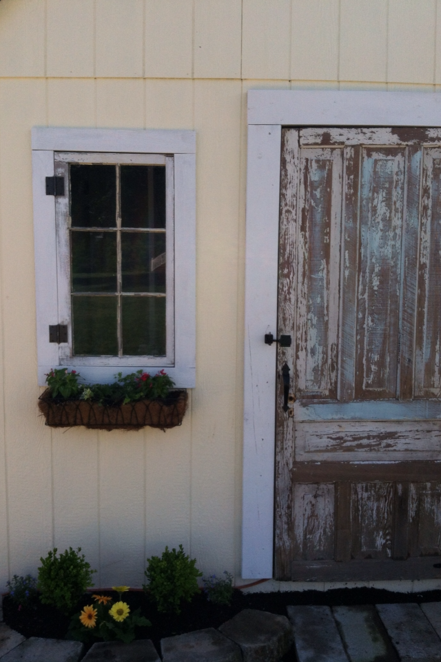 Could not bring myself to paint the orginal windows and door.  You just can't duplicate this look of rustic time worn charm.
