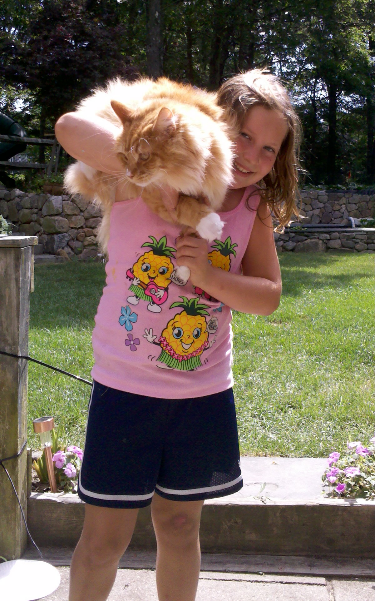 Courtney with "Fred" our 22 pound 18 month old Maine Coon Cat