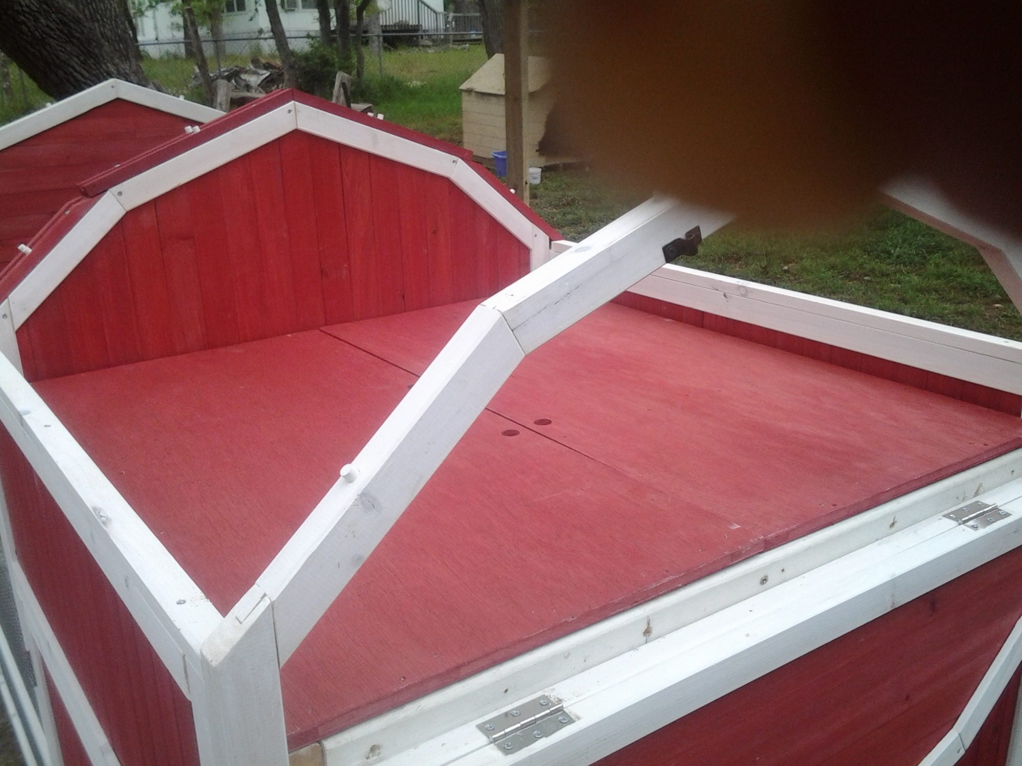 covered loft when not in use for storage of feeders and waterers as well as heat lamp keeps everything together.