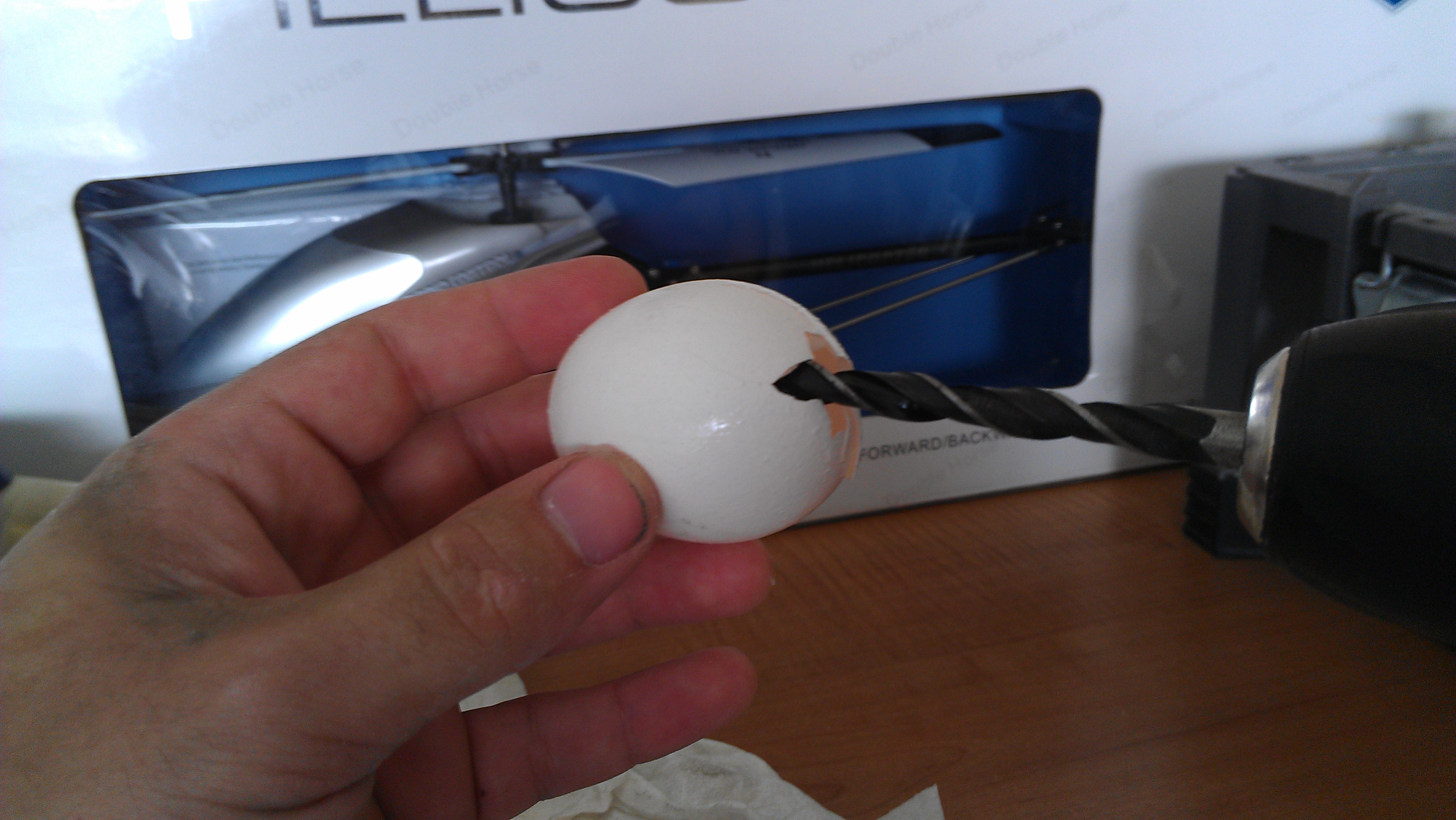Create a hole at the bottom of the egg and drain the inside out